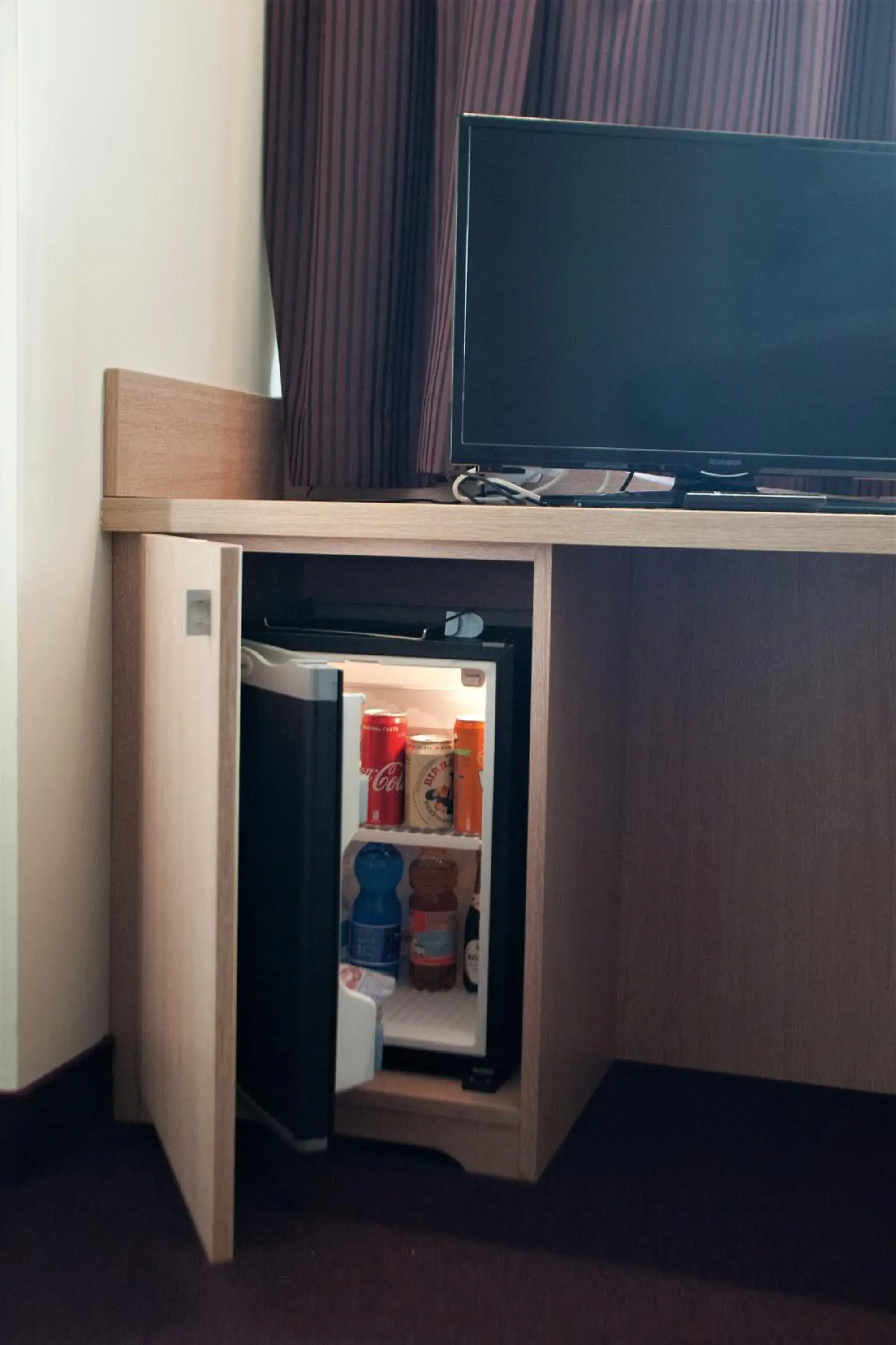 TV/Entertainment Center in Hotel Capital