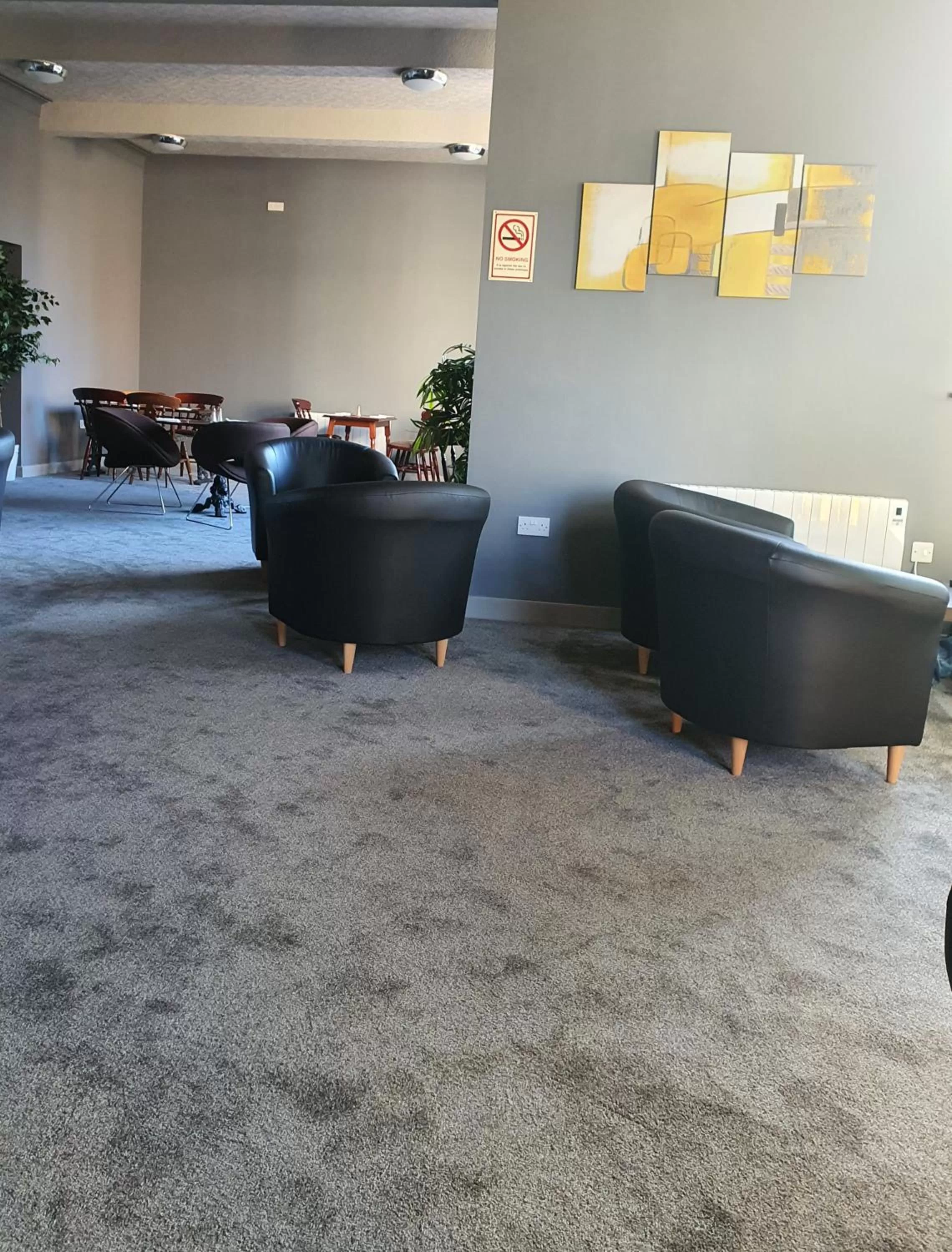 Lounge or bar in Harleys Inn