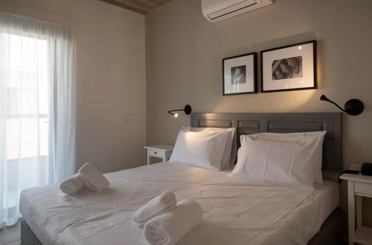 Bed in Chapter 5 Hotel