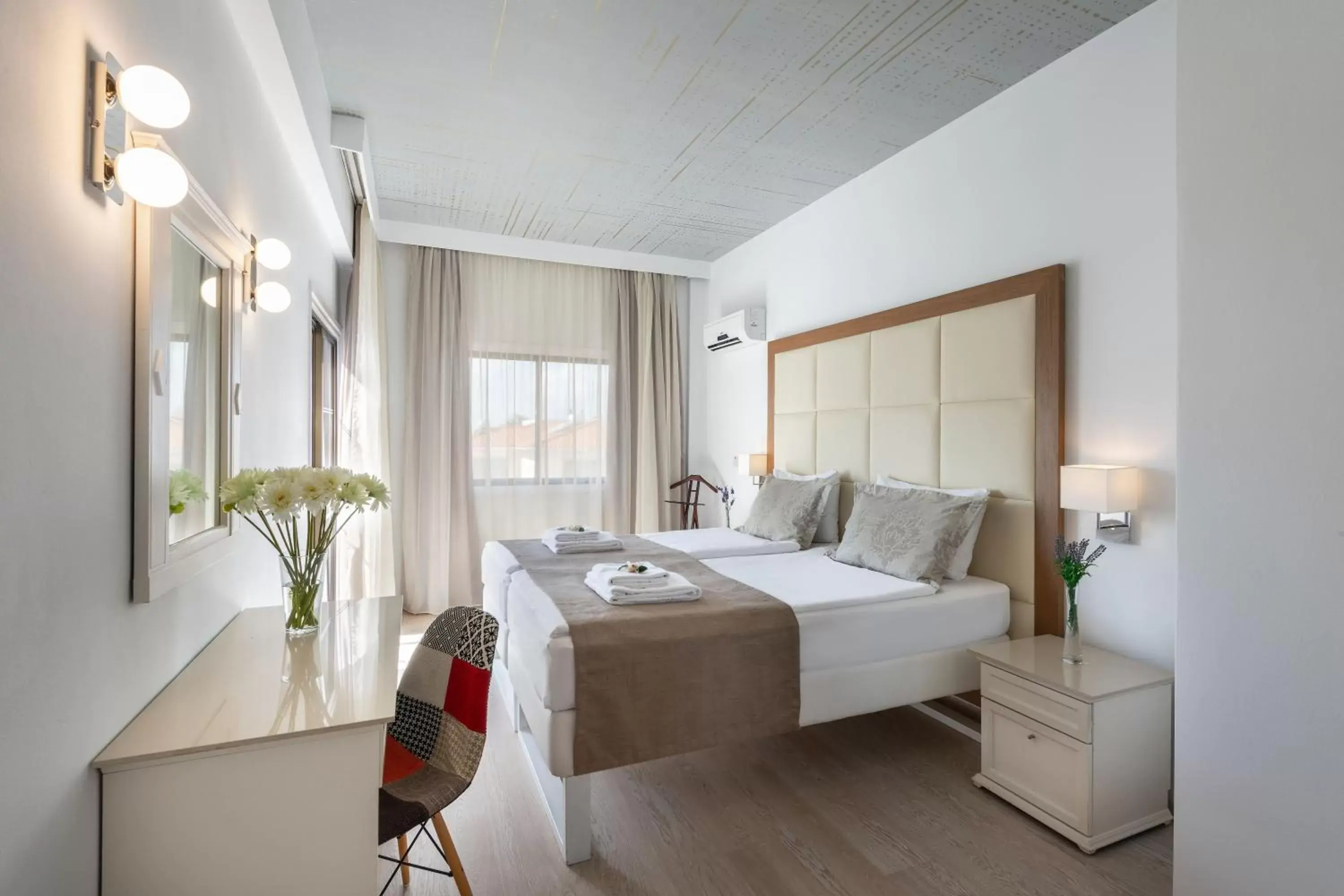 Bedroom in The King Jason Paphos - Designed for Adults by Louis Hotels