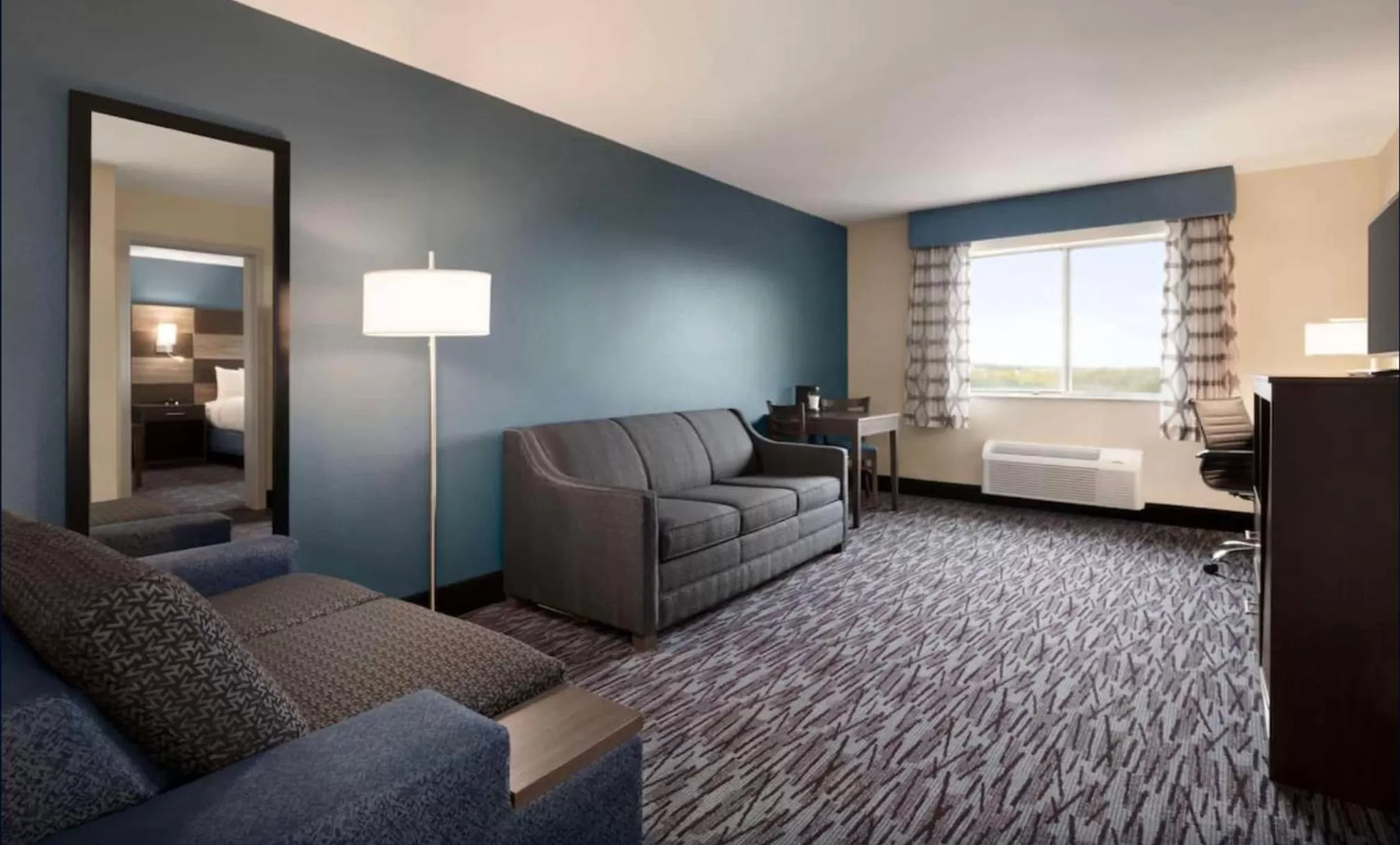 Living room in AmericInn by Wyndham Dodgeville