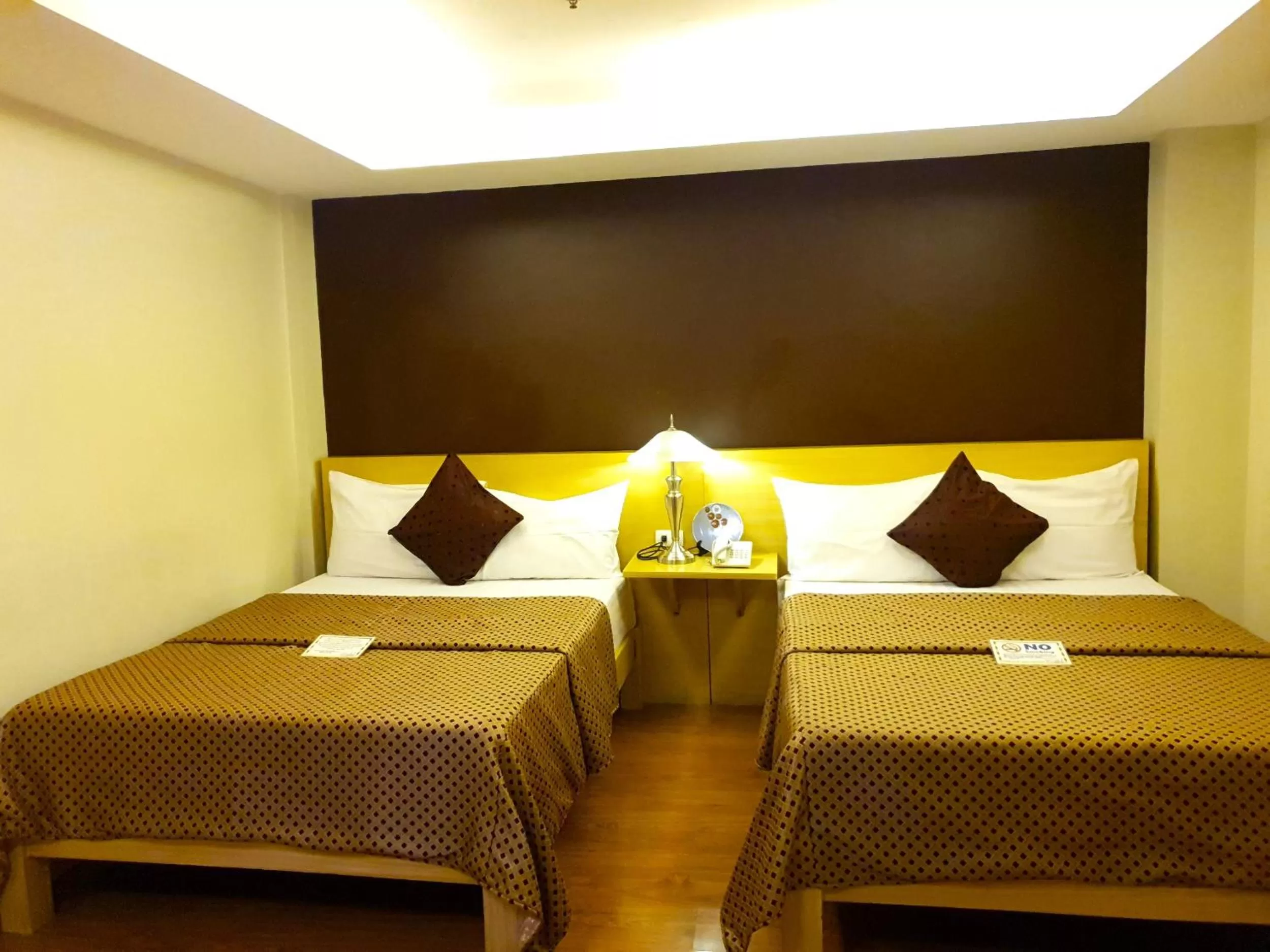 Bed in Festive Hotel Makati