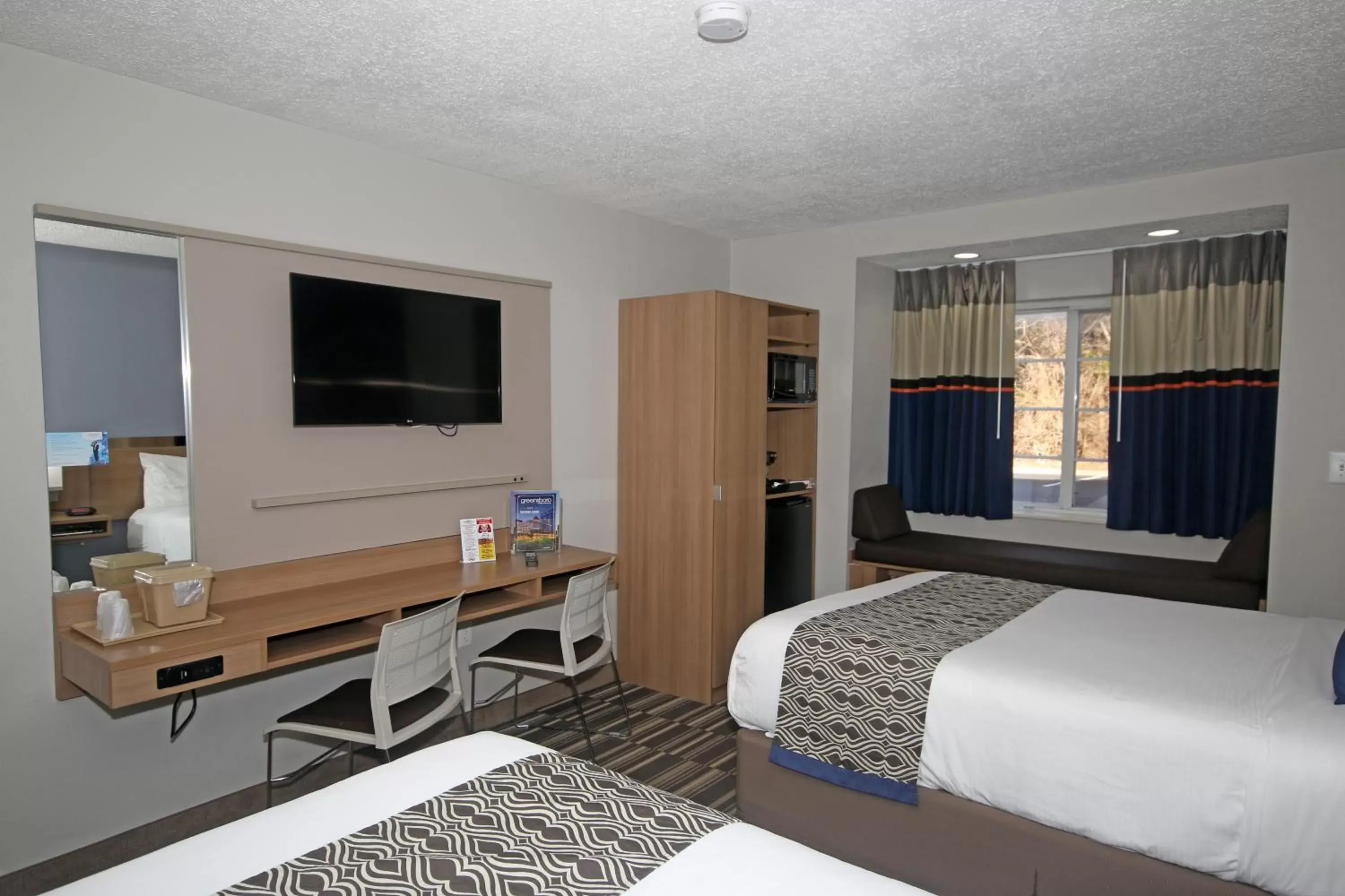 TV and multimedia, TV/Entertainment Center in Microtel Inn by Wyndham Greensboro