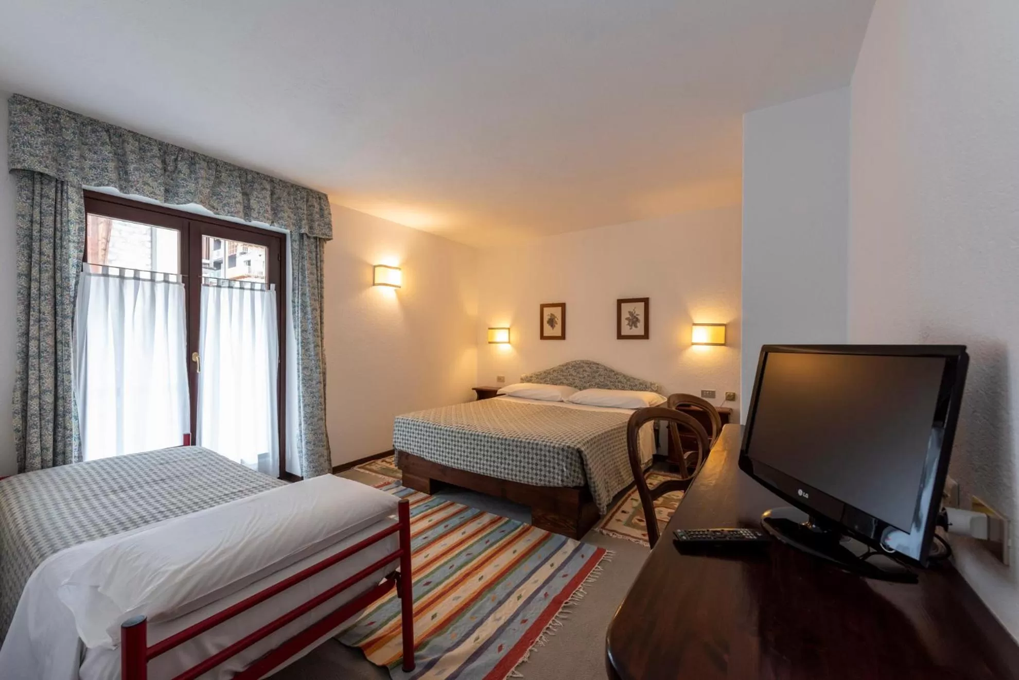 Bed in Hotel Triolet