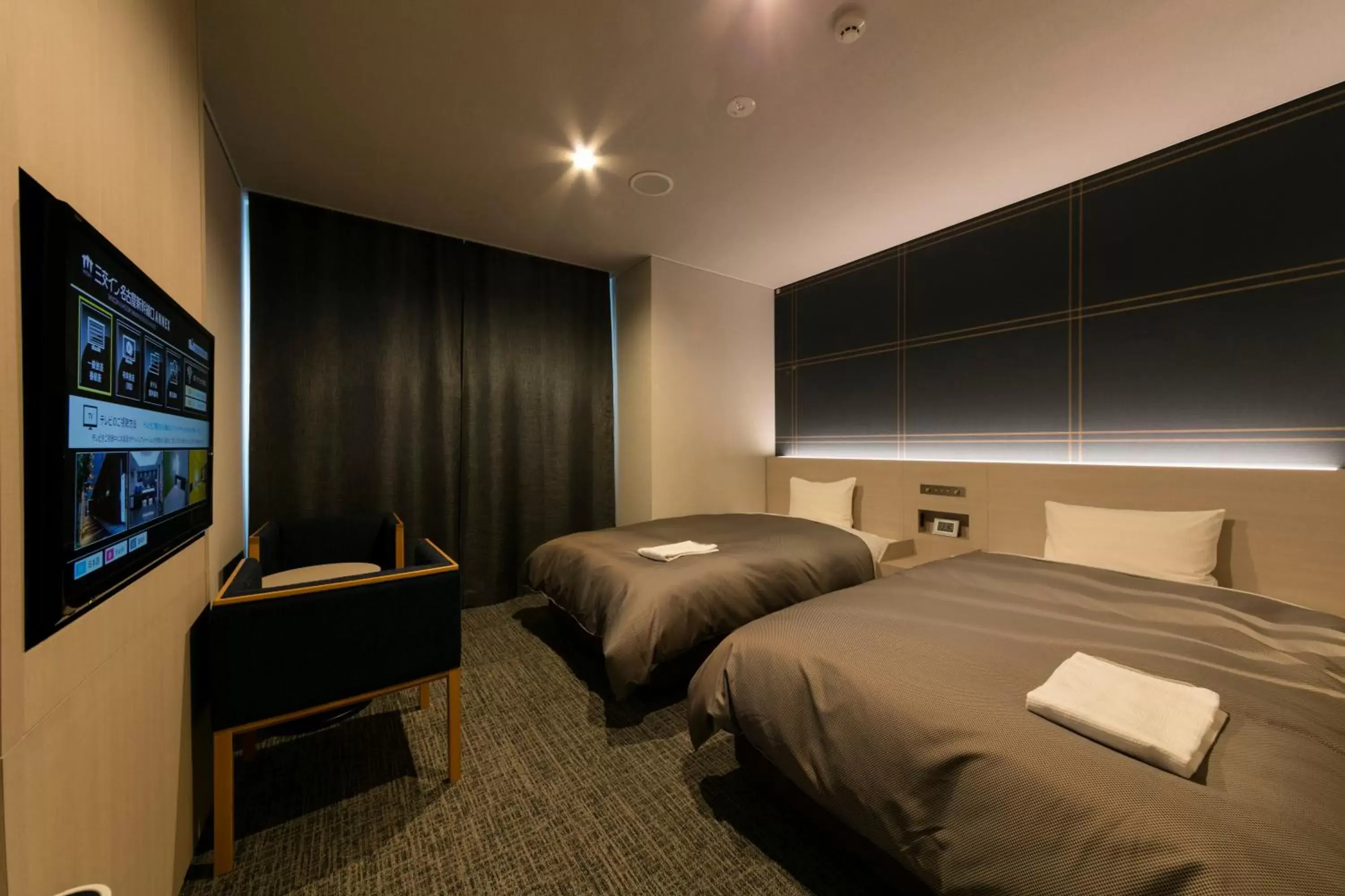 Photo of the whole room, Bed in Sanco Inn Nagoya Shinkansen-guchi Annex