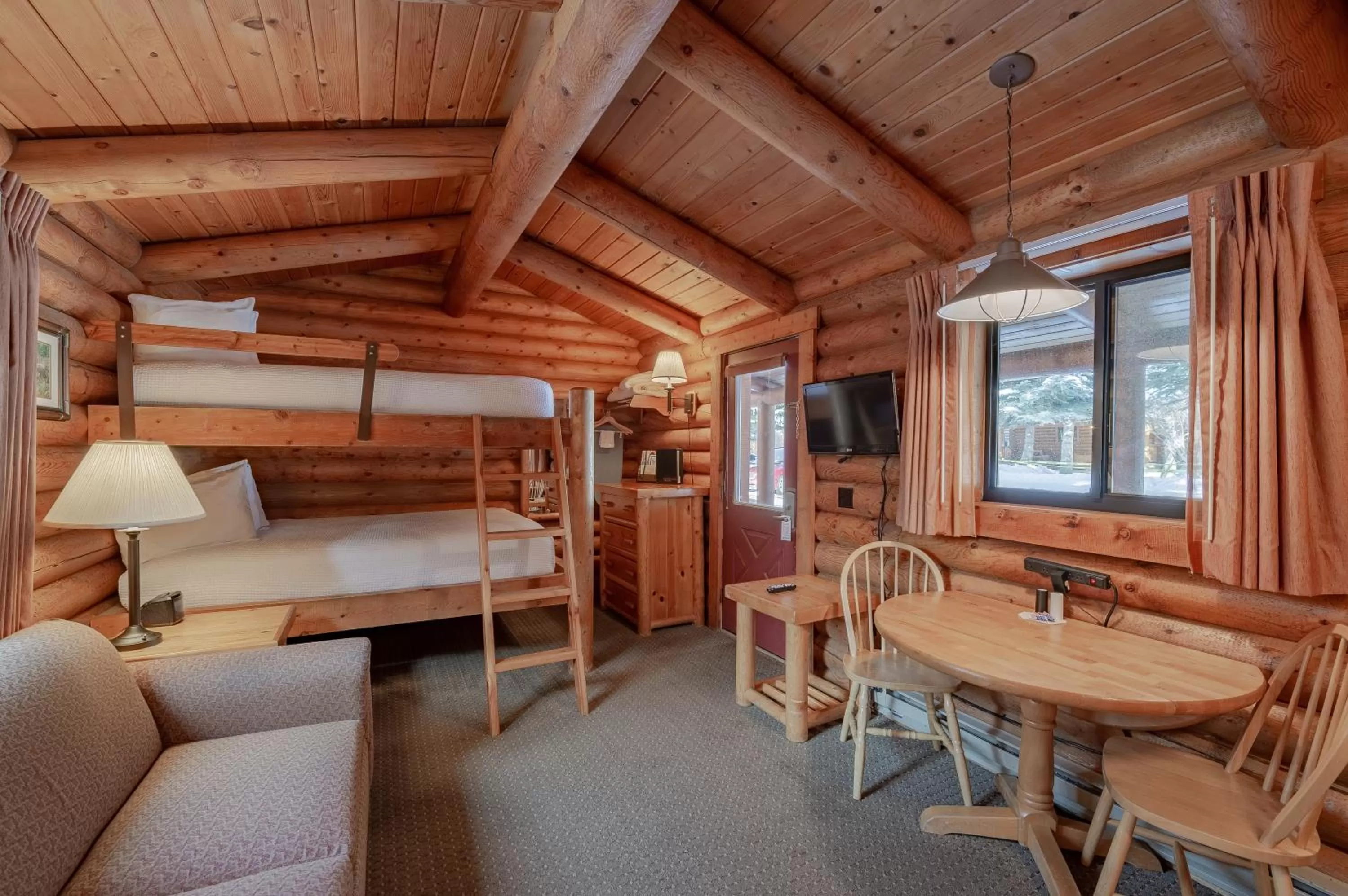 Seating area, Bed in Cowboy Village Resort