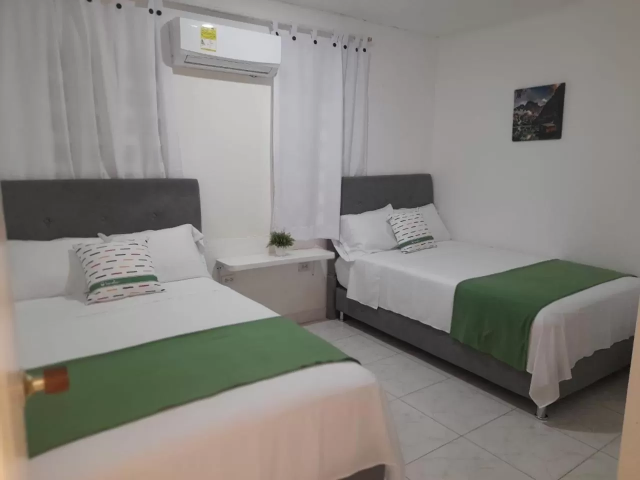 Bed in Tita’s Airport Hotel