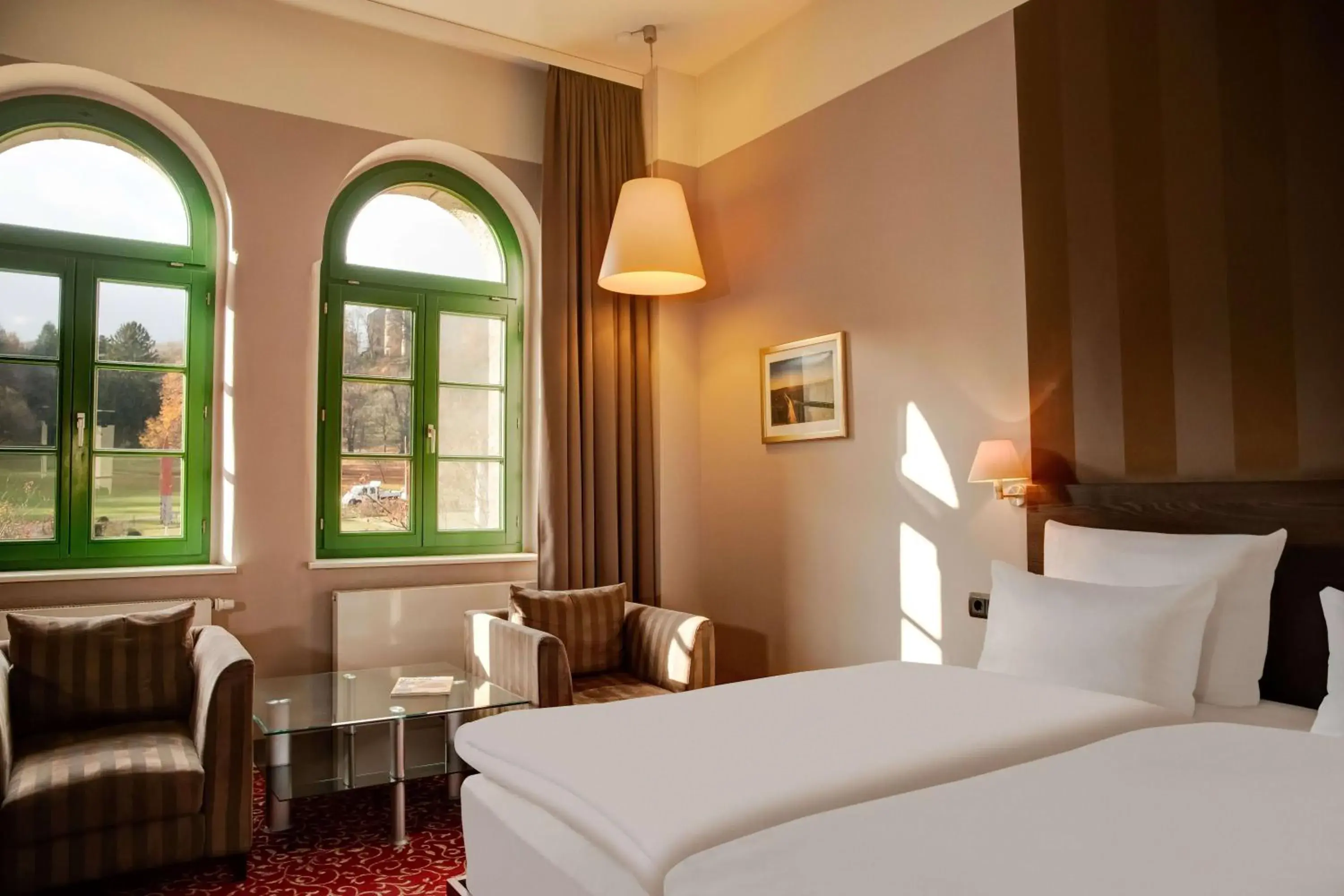 Photo of the whole room, Bed in GreenLine Schlosshotel Blankenburg