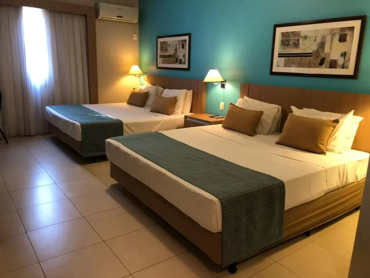 Bed in Comfort Suites Flamboyant Goiânia