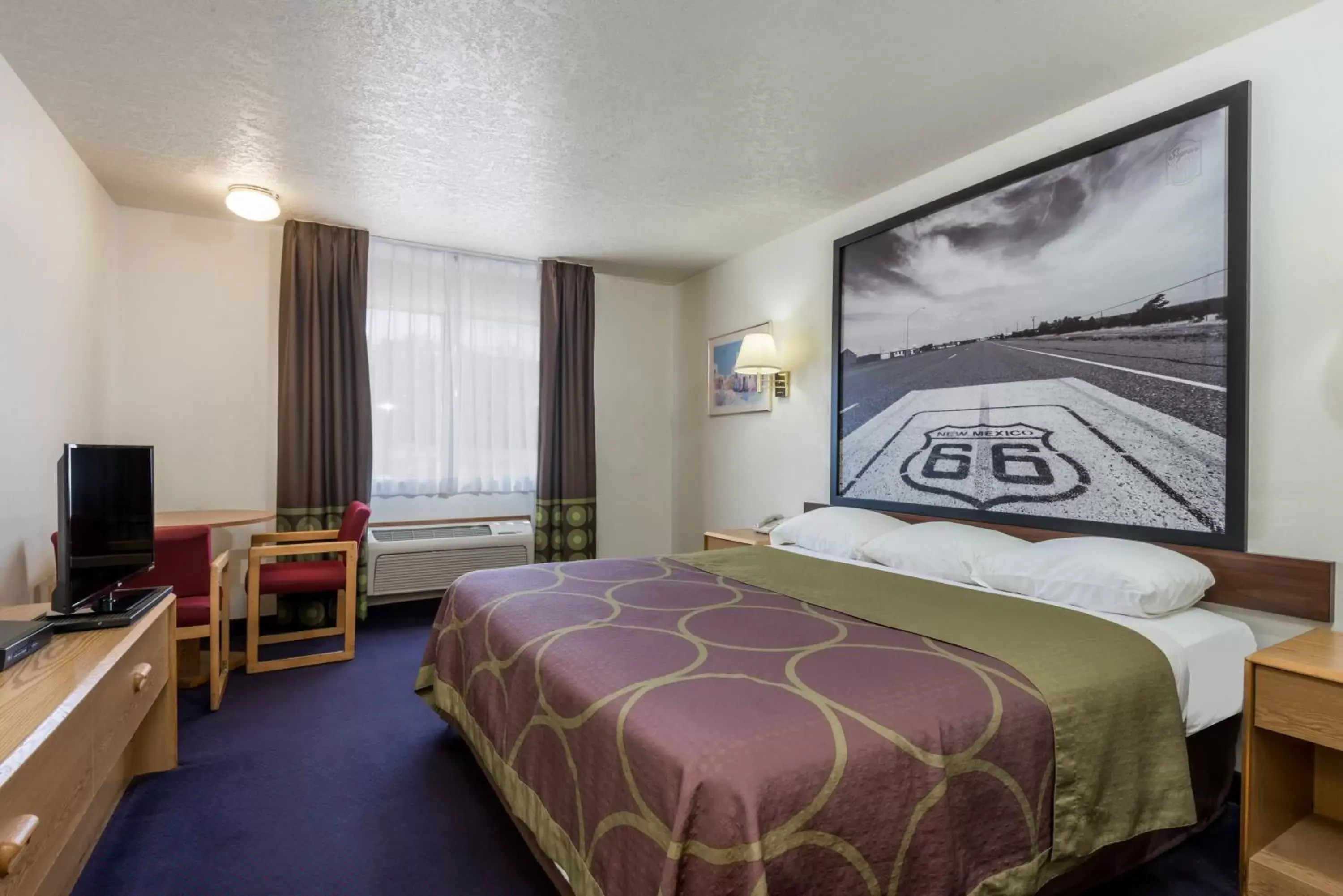 Bed in Super 8 by Wyndham Bernalillo