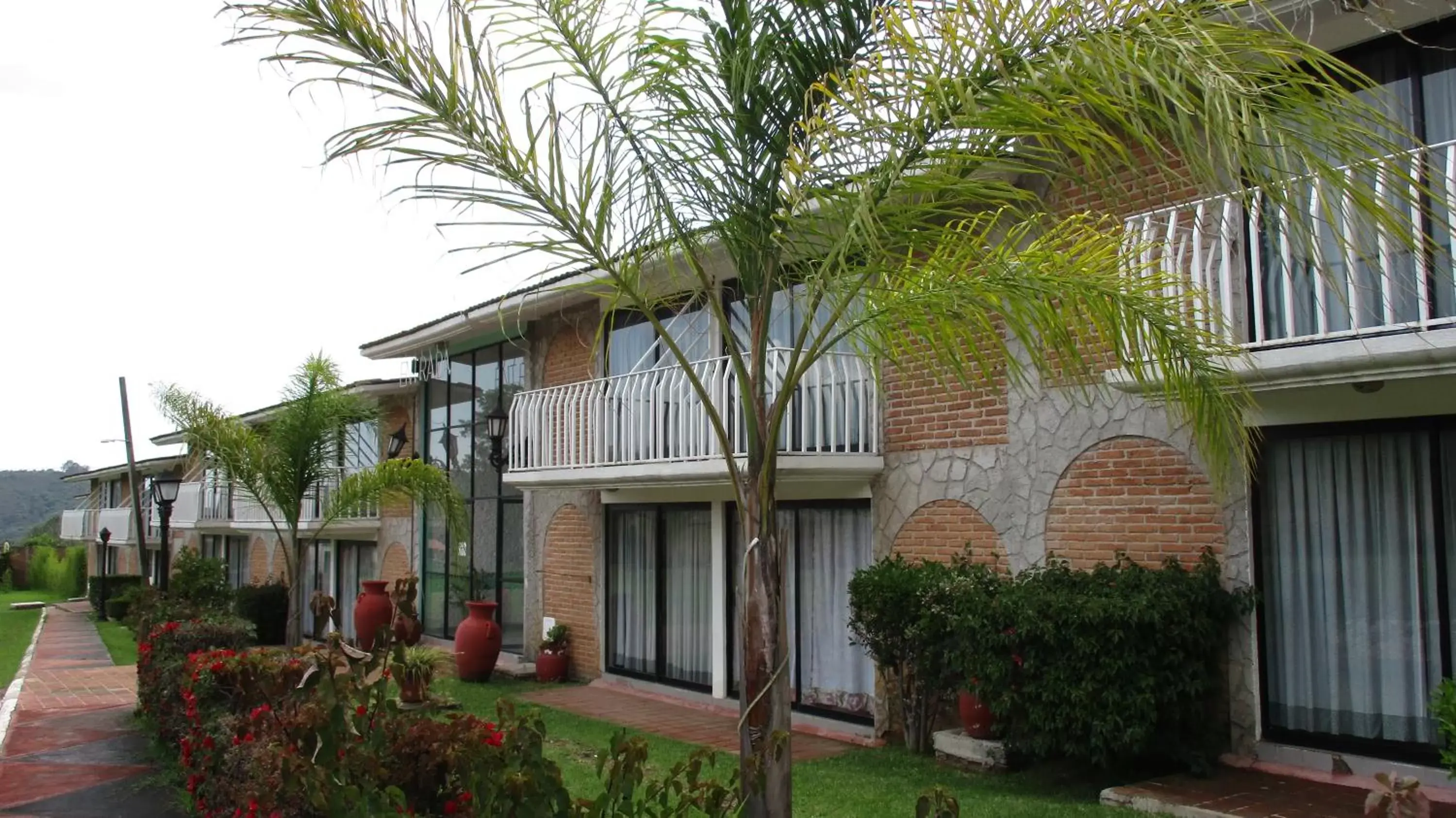 Garden view, Property Building in Hotel Villa Monarca Inn