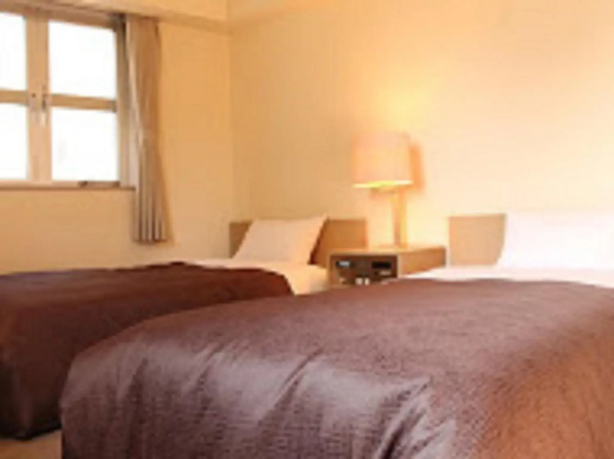 Bed in HOTEL LiVEMAX BUDGET Fuchu Annex