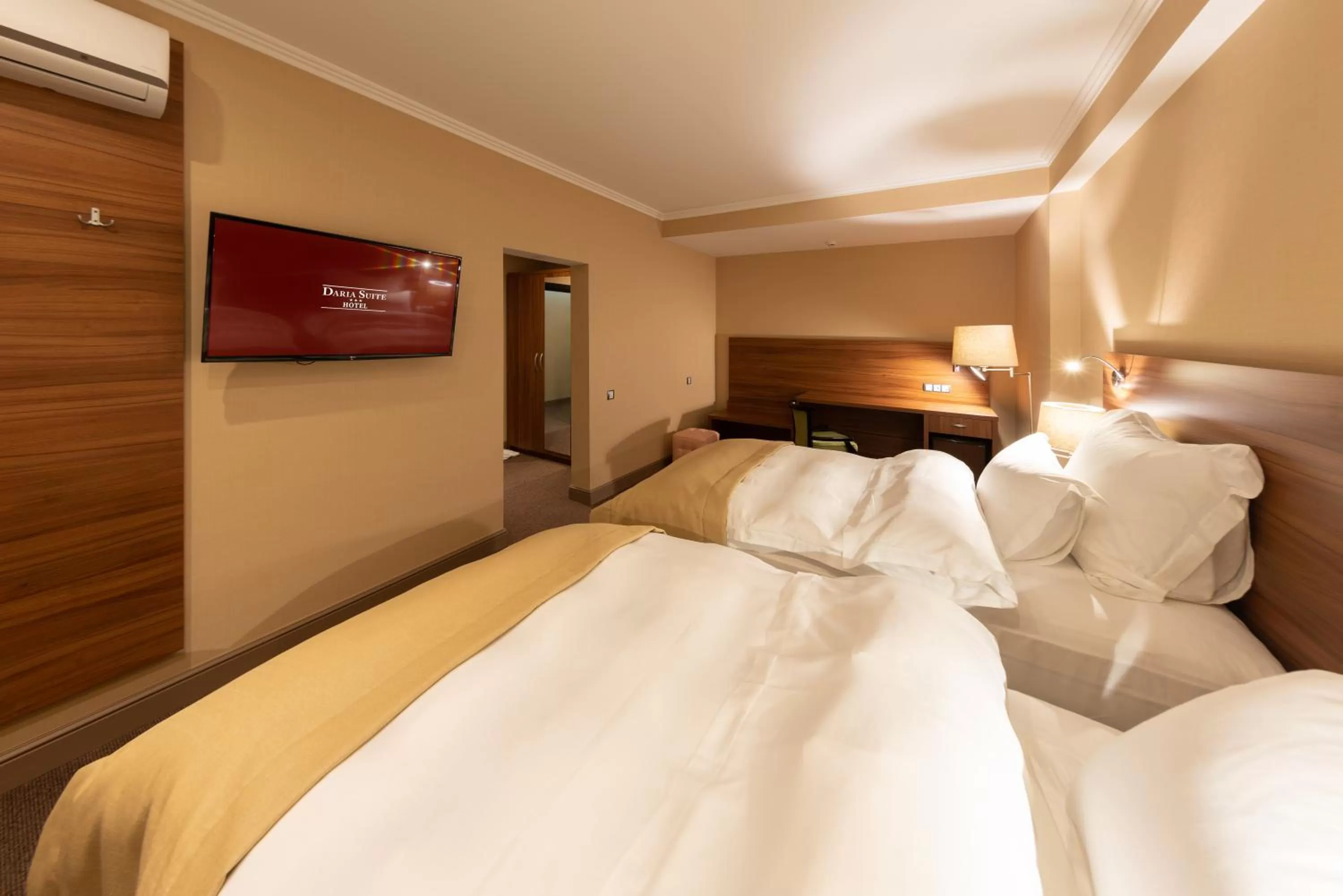 Photo of the whole room, Bed in Daria Suite