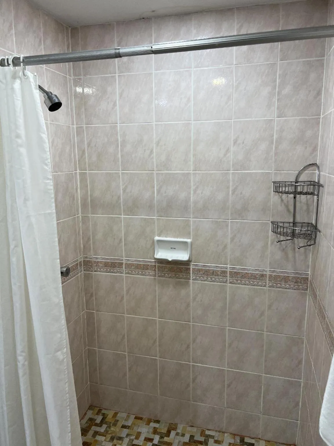 Shower in Mall Suites Hotel