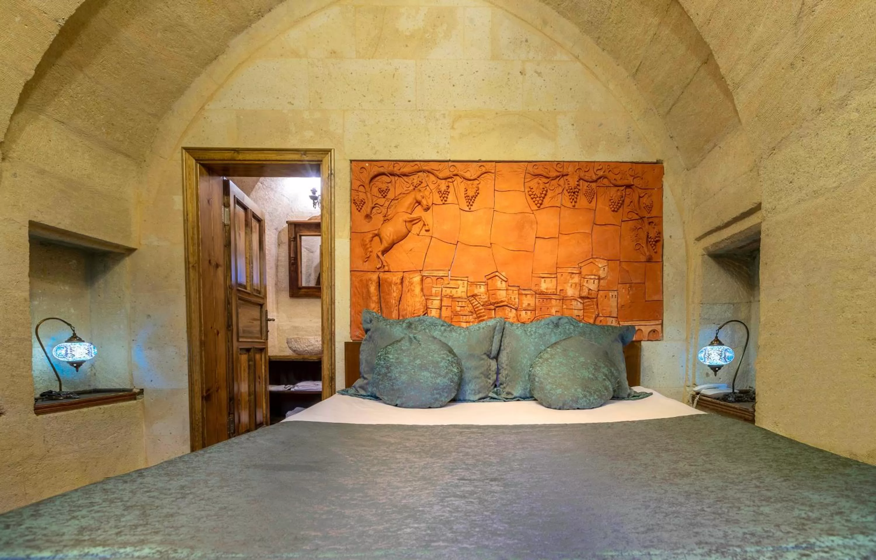 Bed in Adora Cave Suites -