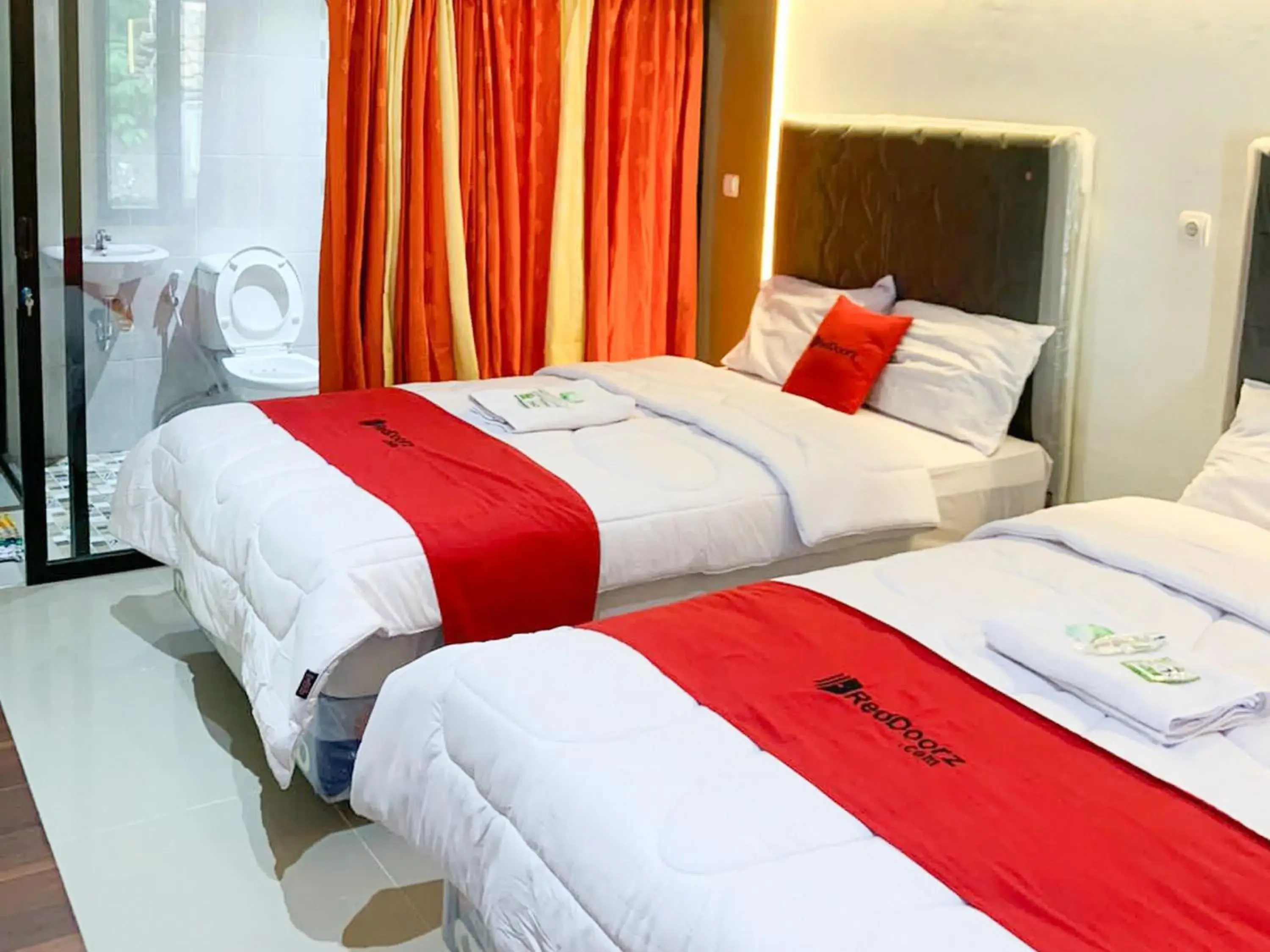 Bed in RedDoorz near Museum Gunung Merapi