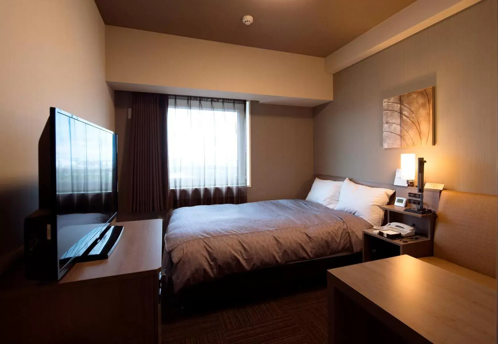 Photo of the whole room, Bed in HOTEL ROUTE-INN Osaka Takaishi Hagoromo Ekimae