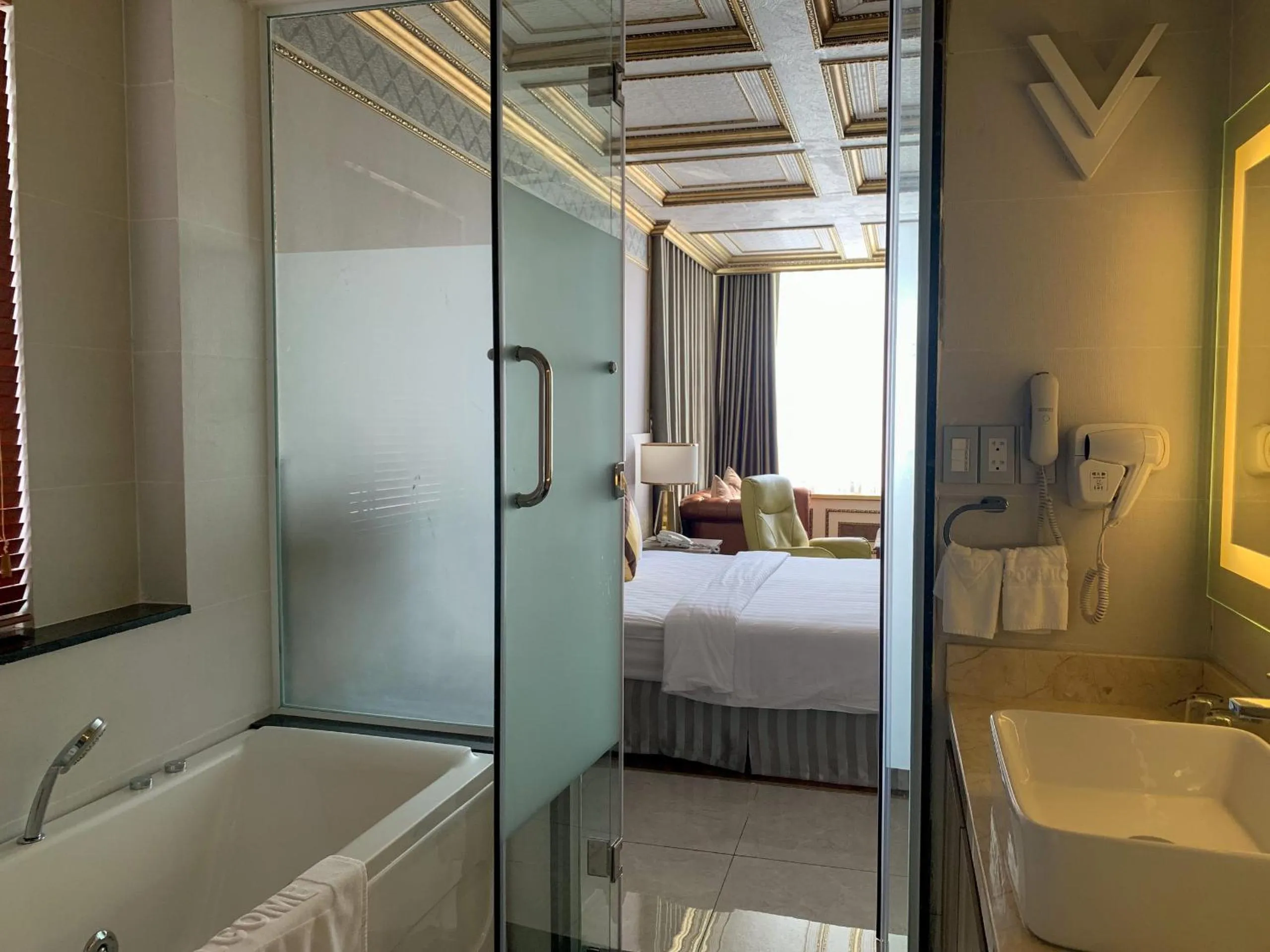 Bathroom, Bed in Lotus Saigon Hotel