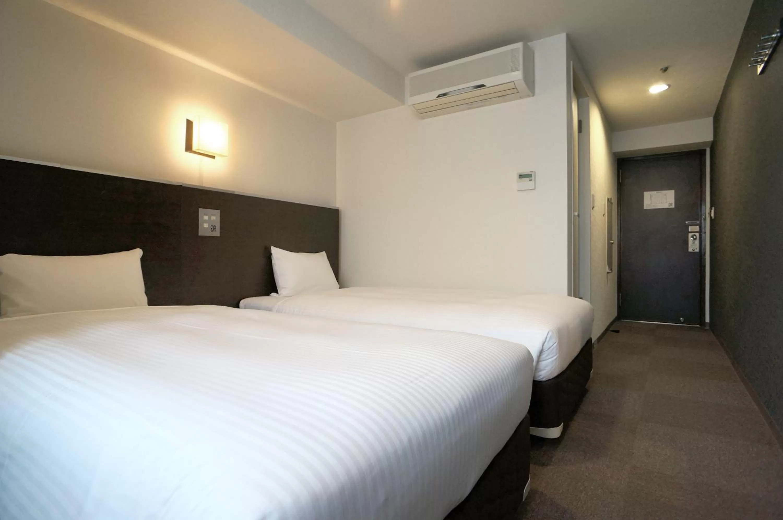 Shower, Bed in Green Rich Hotel Kagoshima Tenmonkan