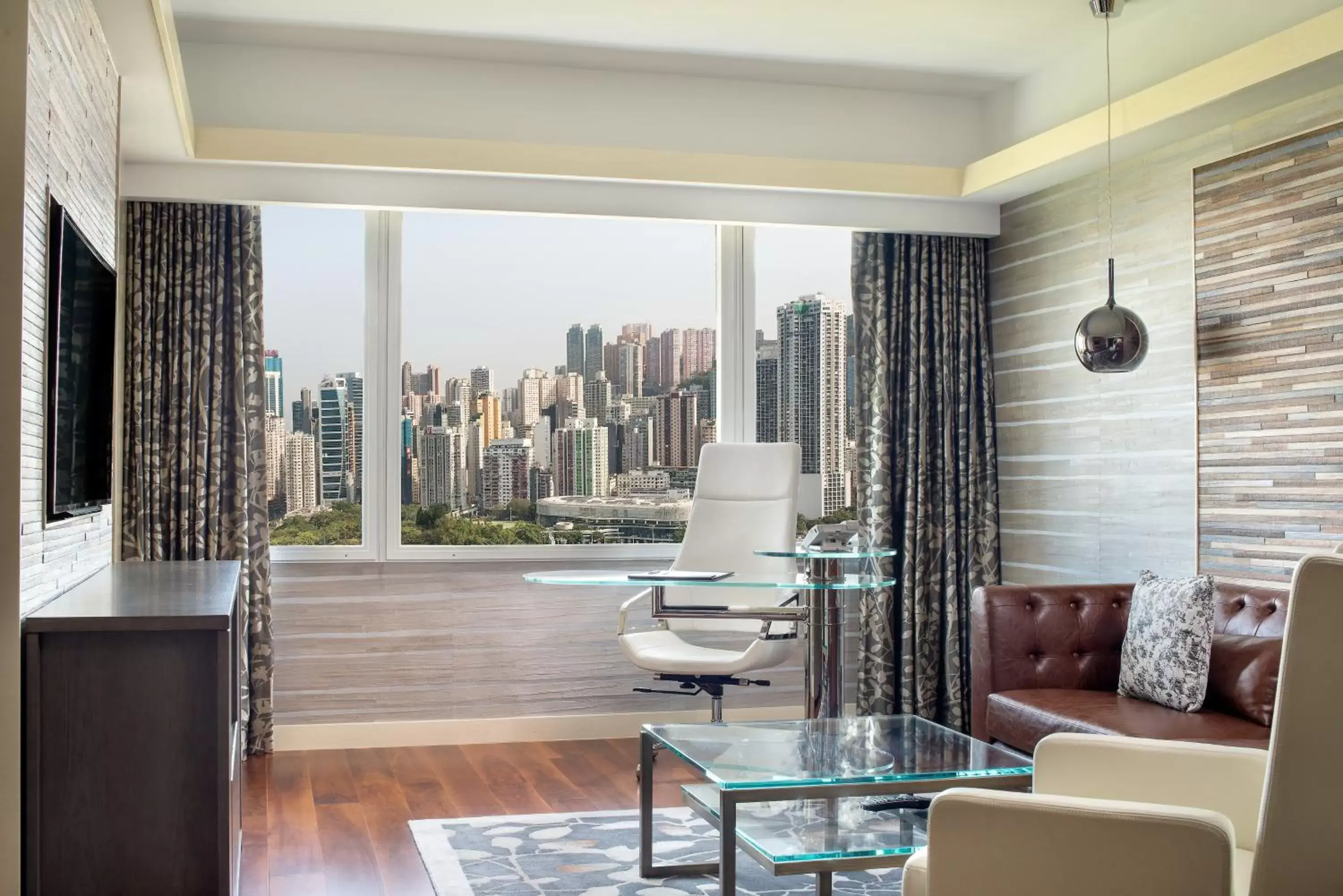 Park Lane Suite with Park and Harbor View in The Park Lane Hong Kong, a Pullman Hotel
