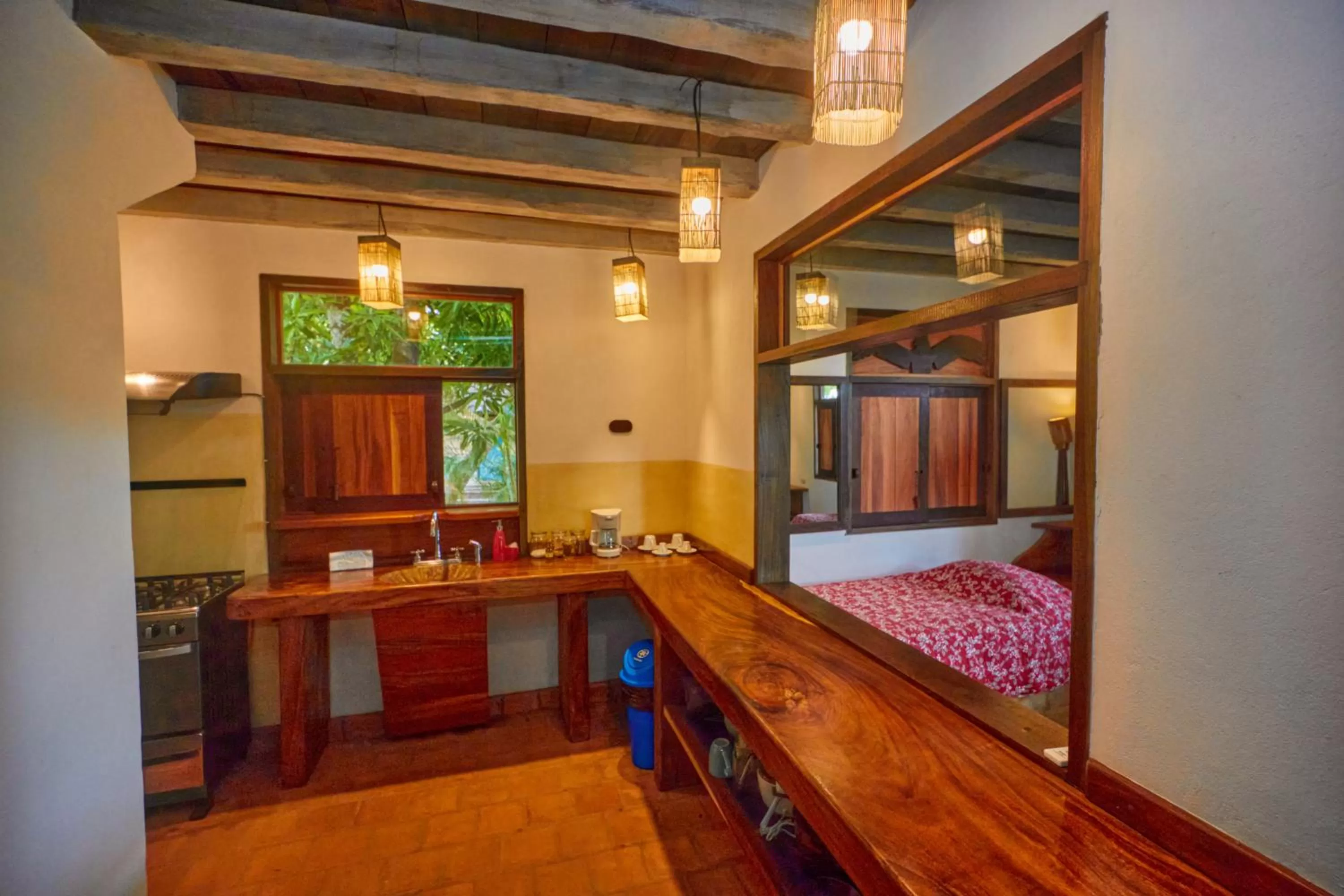 Kitchen or kitchenette, Bed in Hotel Posada Los Destiladeros