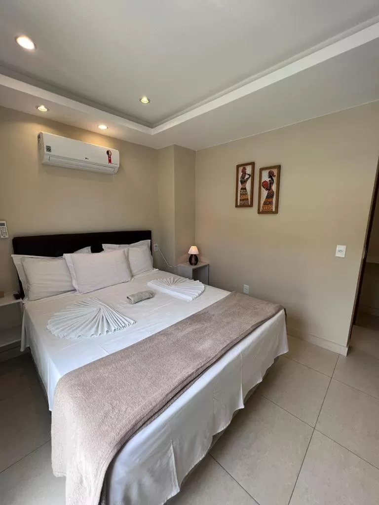 Bed in Pousada Arraial Tropical