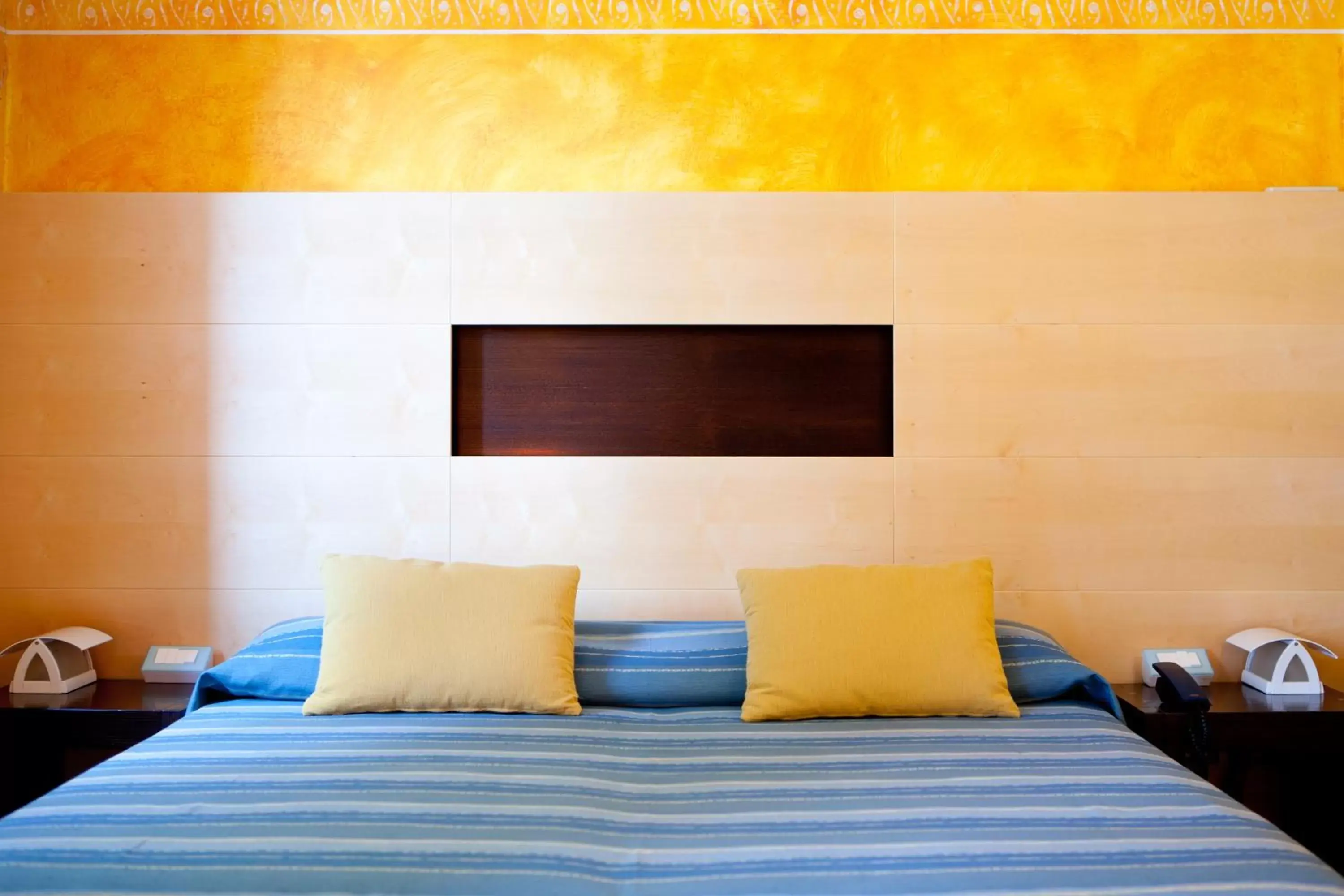 Bed in Hotel Suite Inn