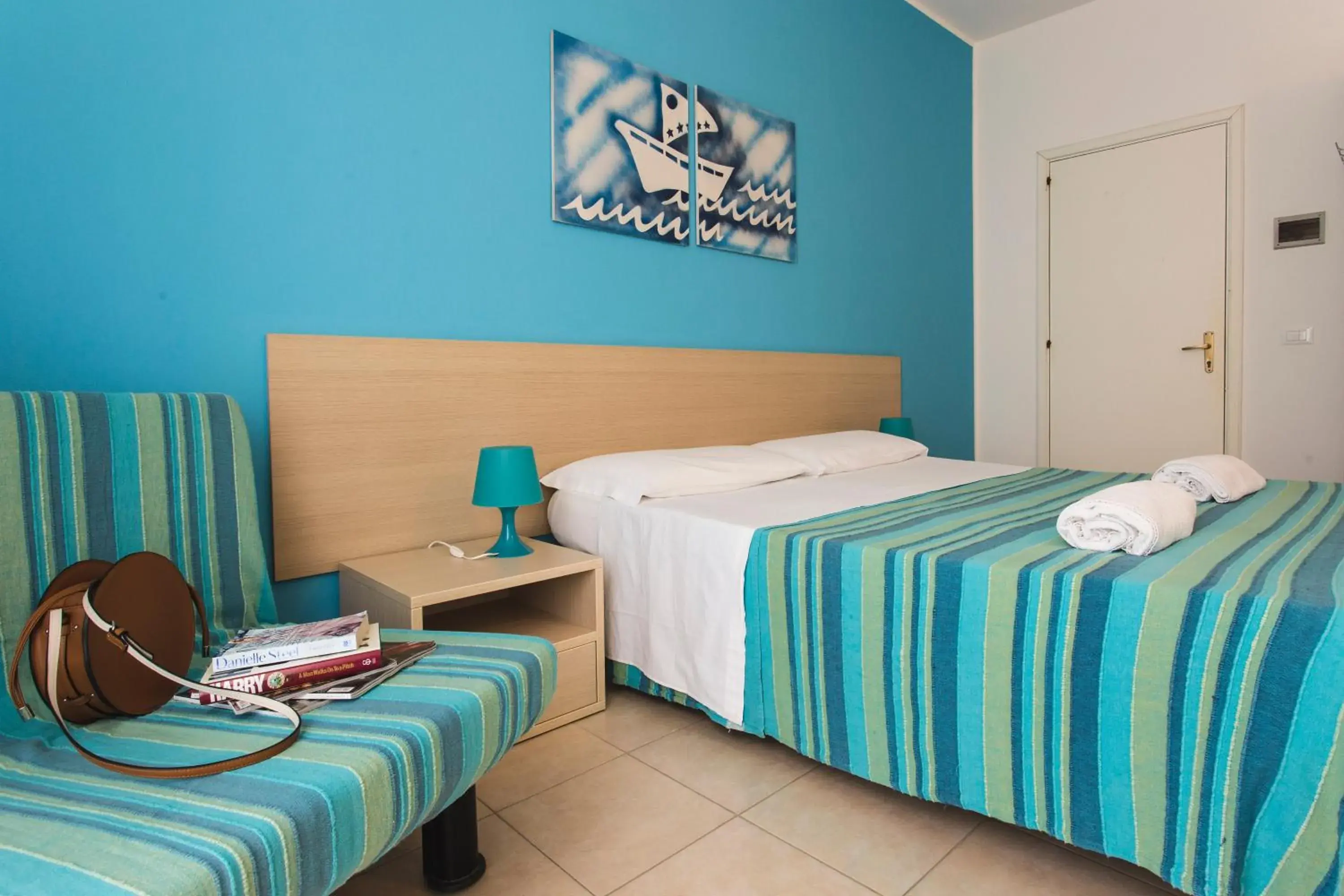 Bed in Hotel Baia Del Sole