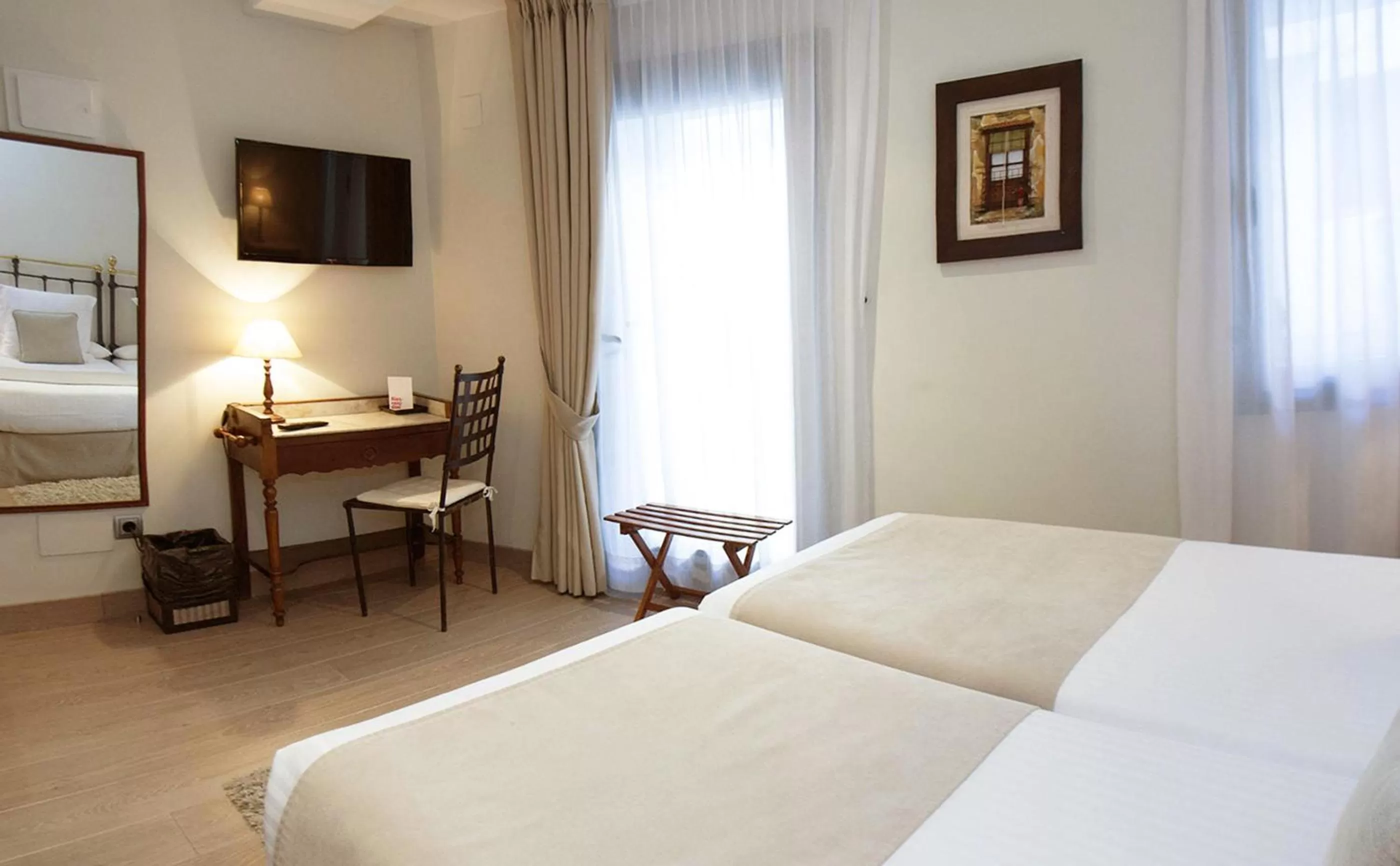 Bed in Le Petit Boutique Hotel