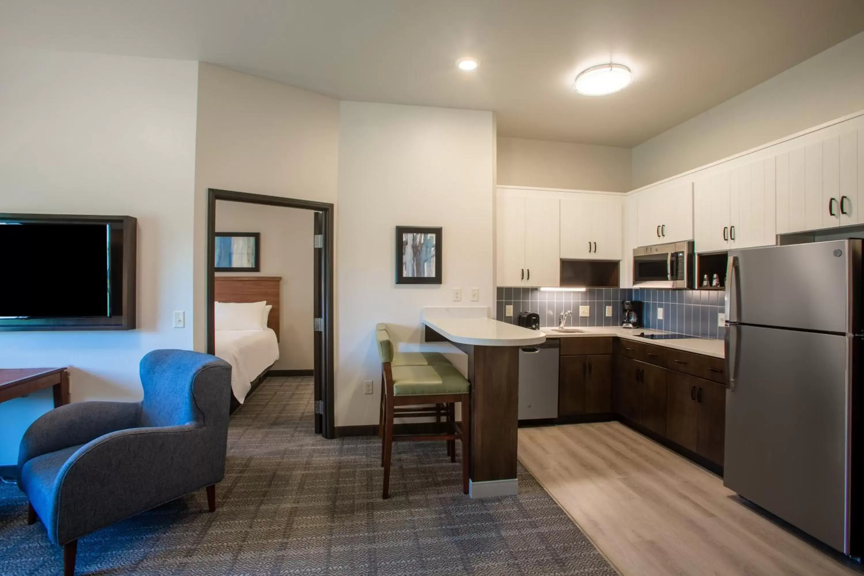 Photo of the whole room, Kitchen/Kitchenette in Staybridge Suites - Sioux Falls Southwest, an IHG Hotel