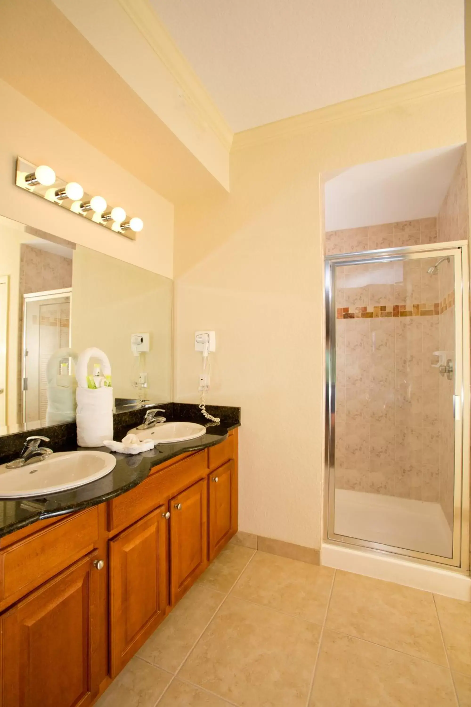 Bathroom, Kitchen/Kitchenette in Lake Buena Vista Resort Village and Spa, a staySky Hotel & Resort Near Disney