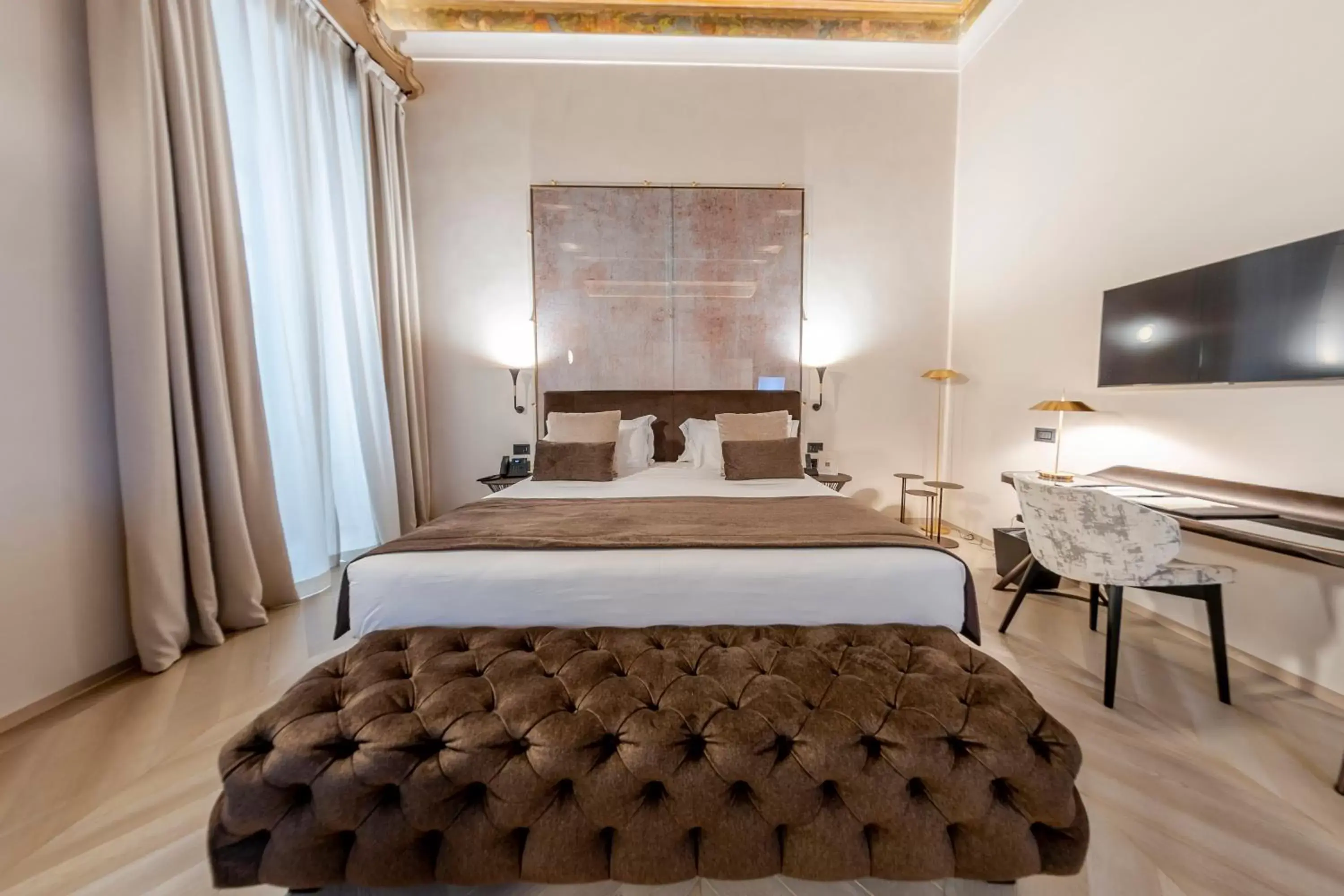 Bed in Martius Private Suites Hotel