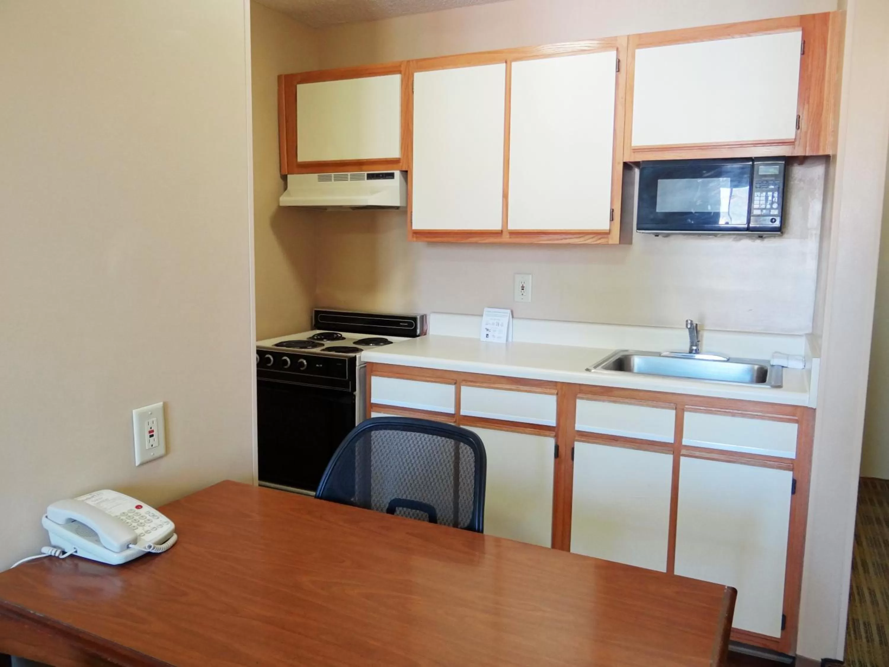 Kitchen or kitchenette in HomeStay Suites