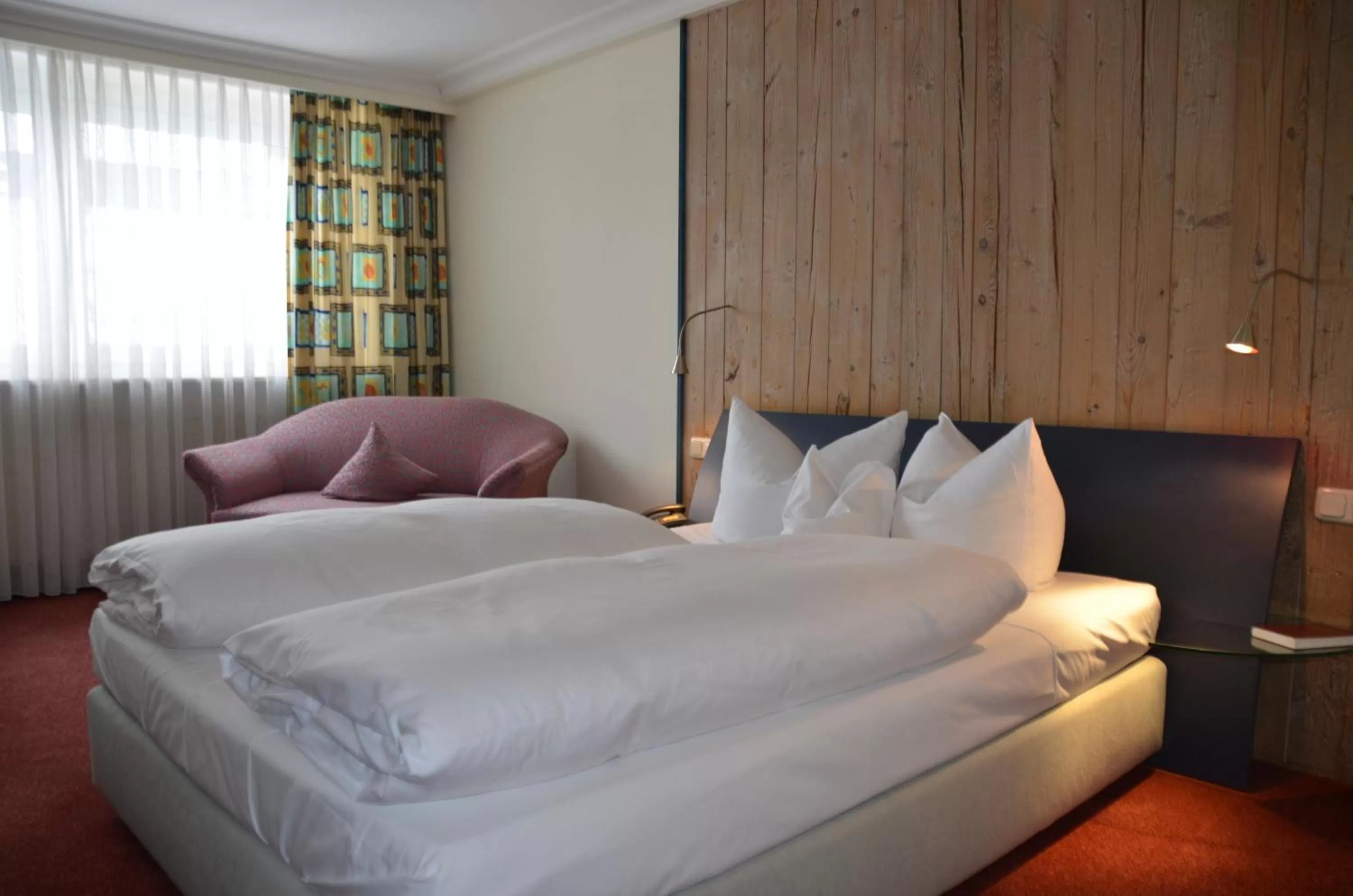 Photo of the whole room, Bed in Ringhotel Alpenhof - Patchworkhotel