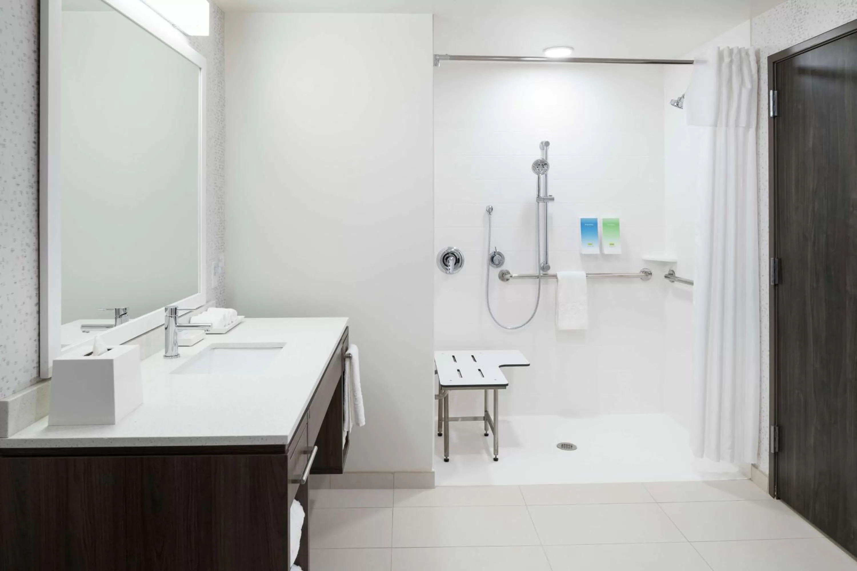 Bathroom in Home2 Suites By Hilton Orlando Airport