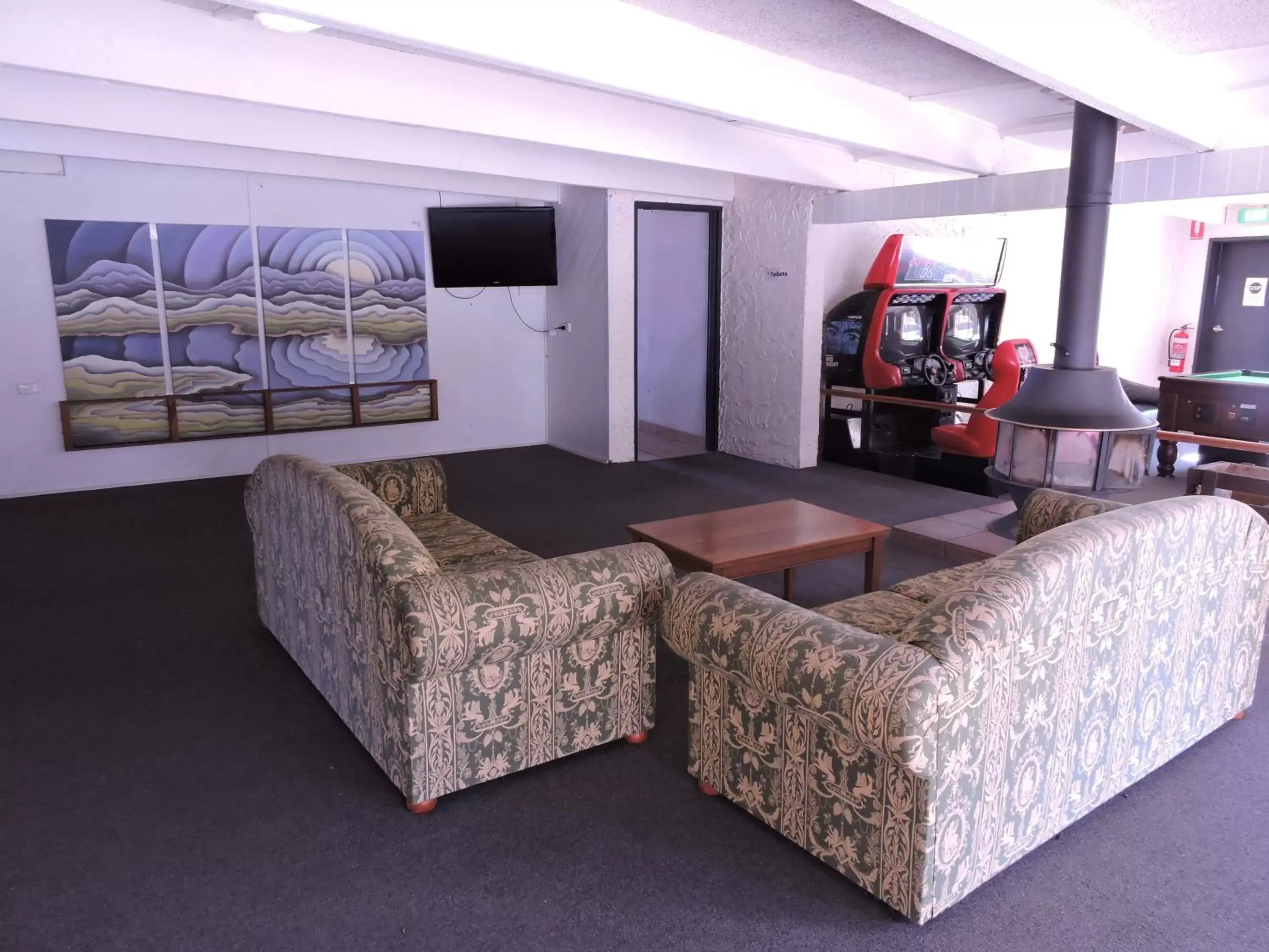 Communal lounge/ TV room, Seating Area in Siesta Villa