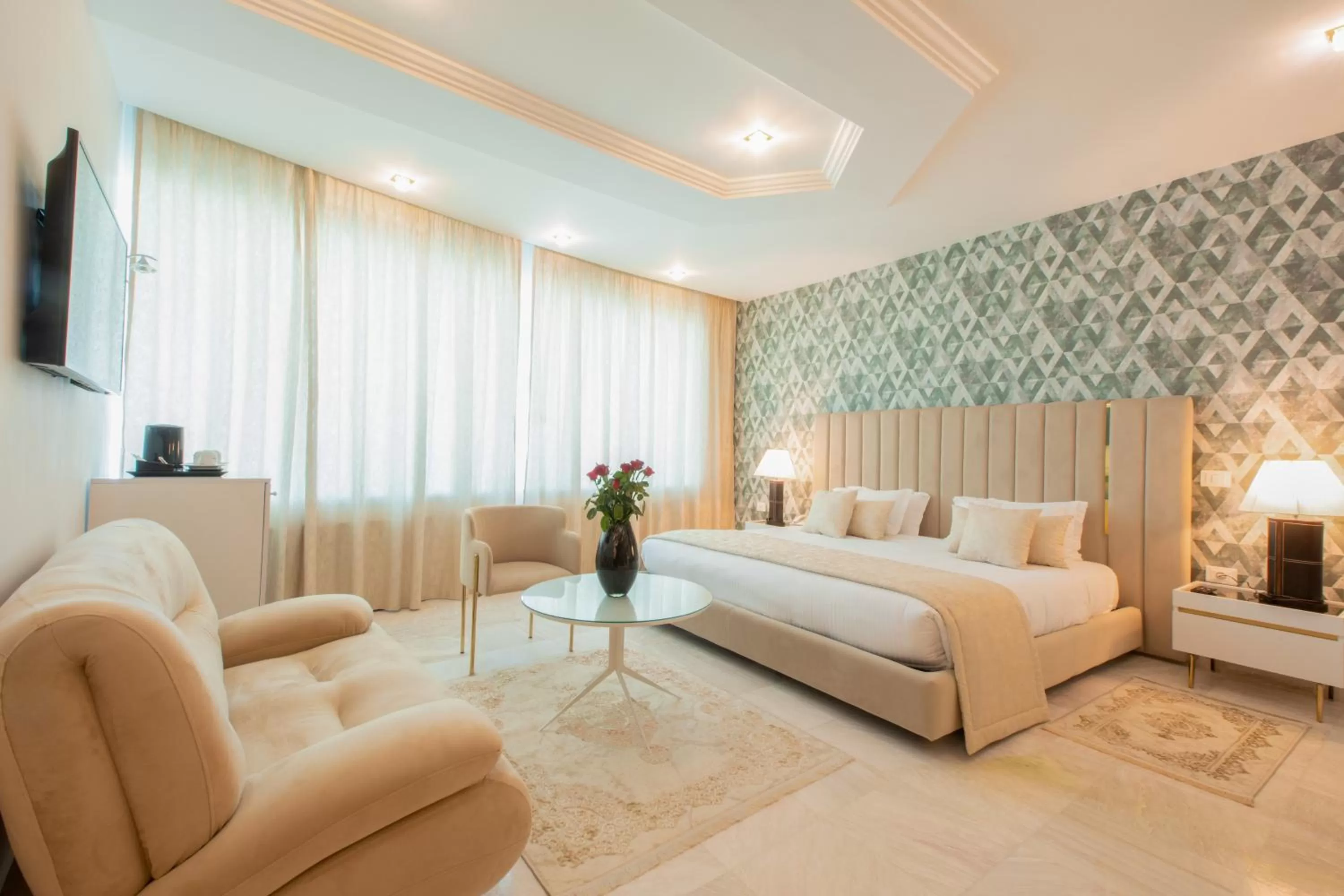 Photo of the whole room, Bed in The Penthouse Suites Hotel