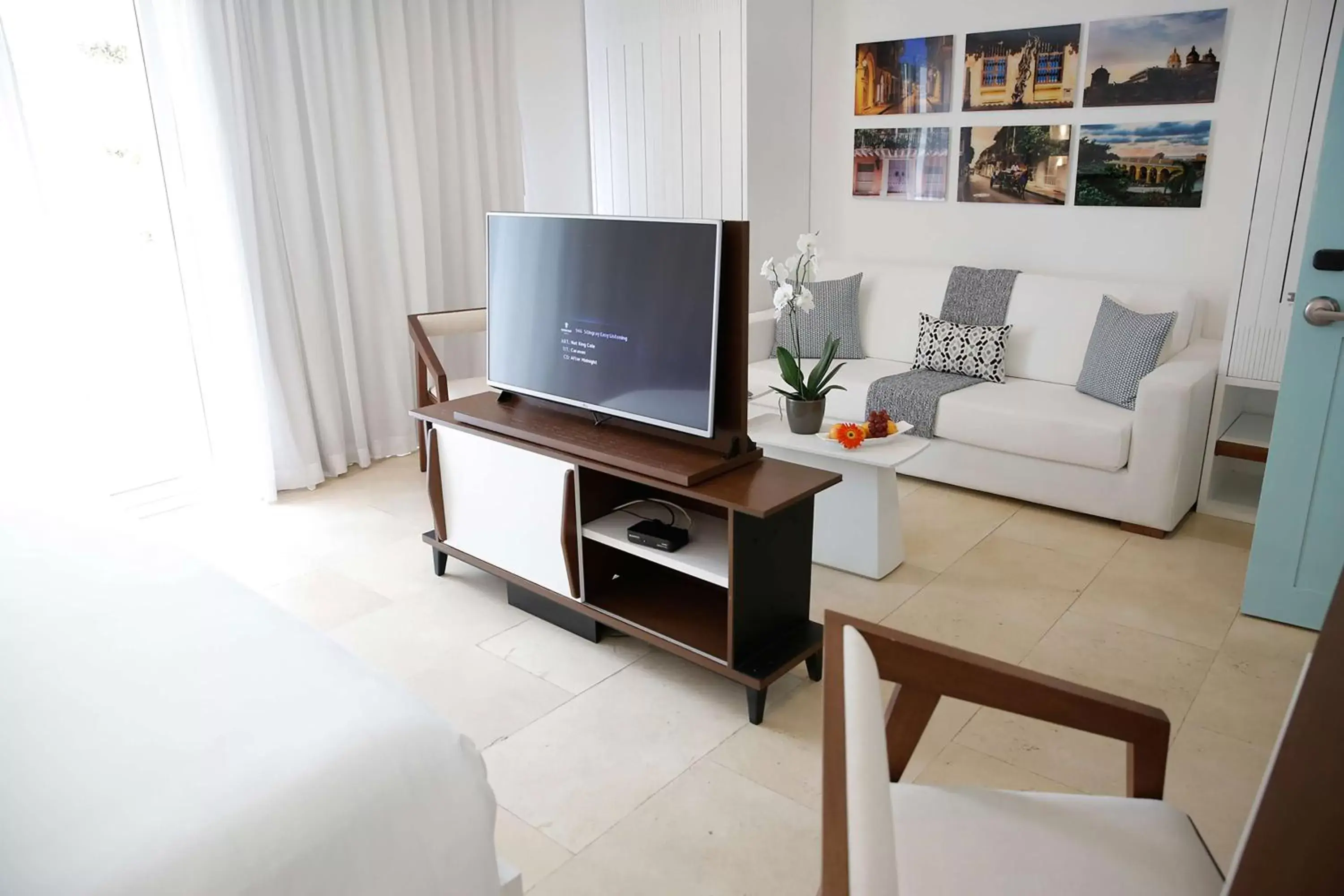 Living room, TV/Entertainment Center in Nacar Hotel Cartagena, Curio Collection by Hilton