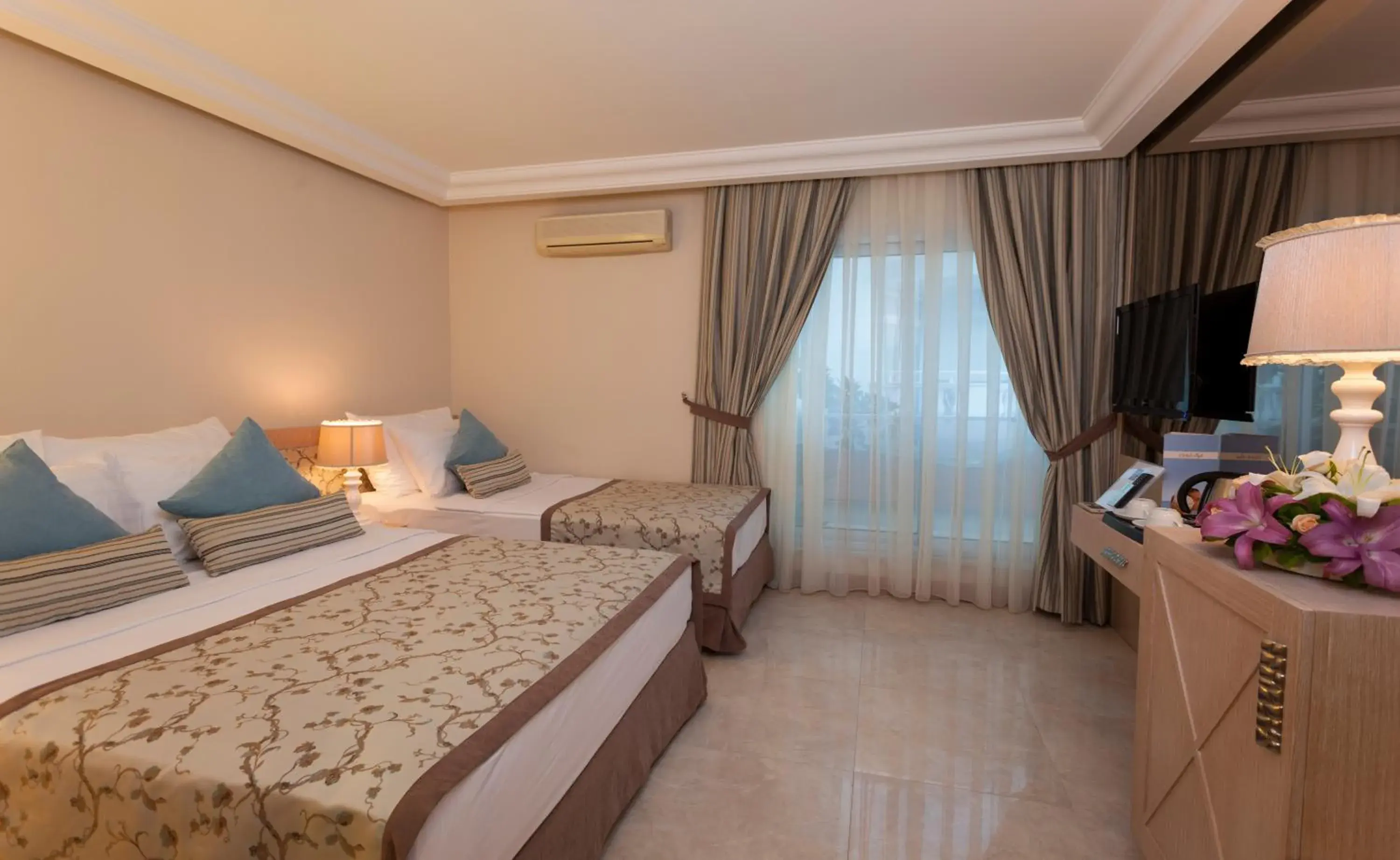 Bed in Xperia Saray Beach Hotel
