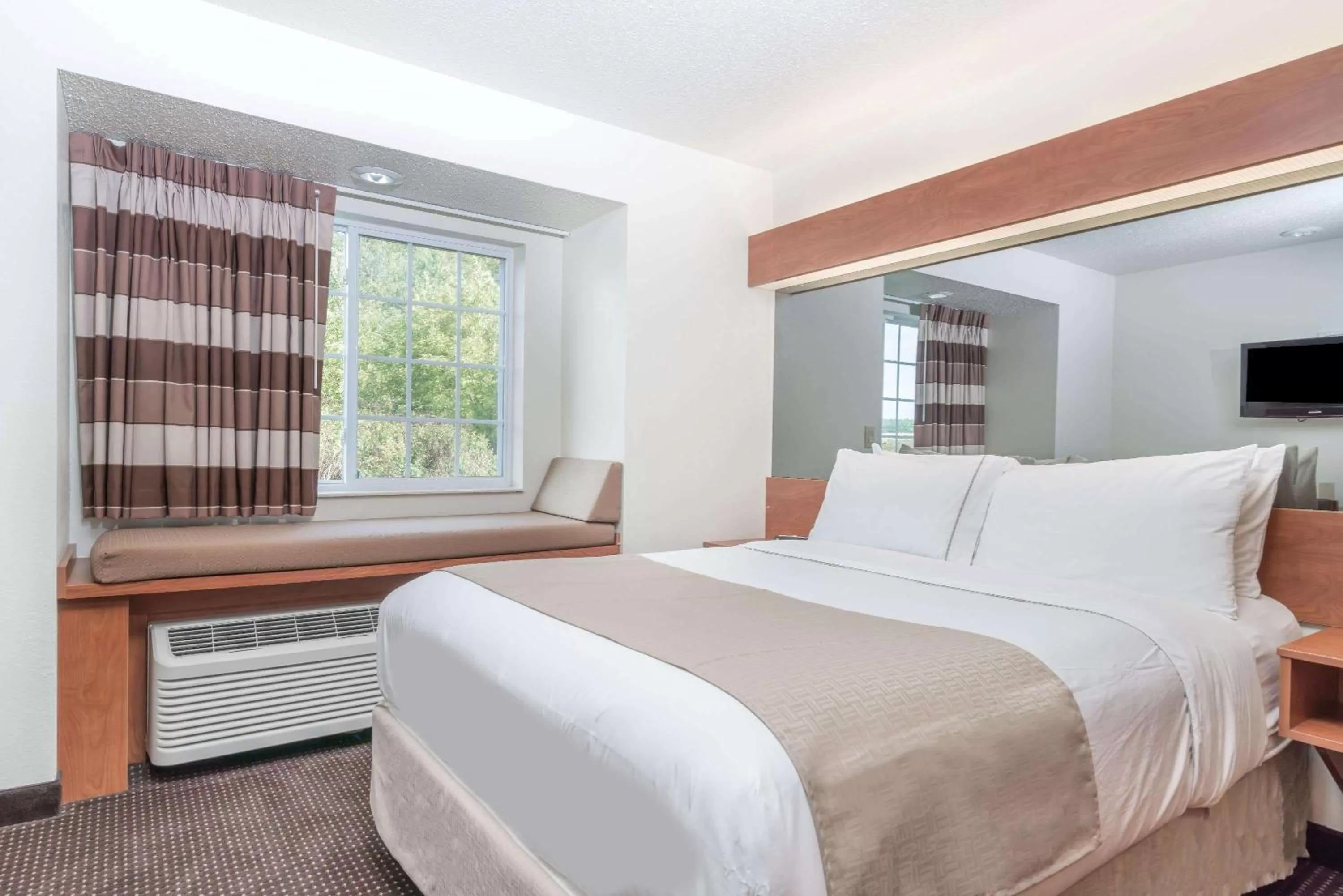 Photo of the whole room, Bed in Microtel Inn & Suites by Wyndham Rice Lake