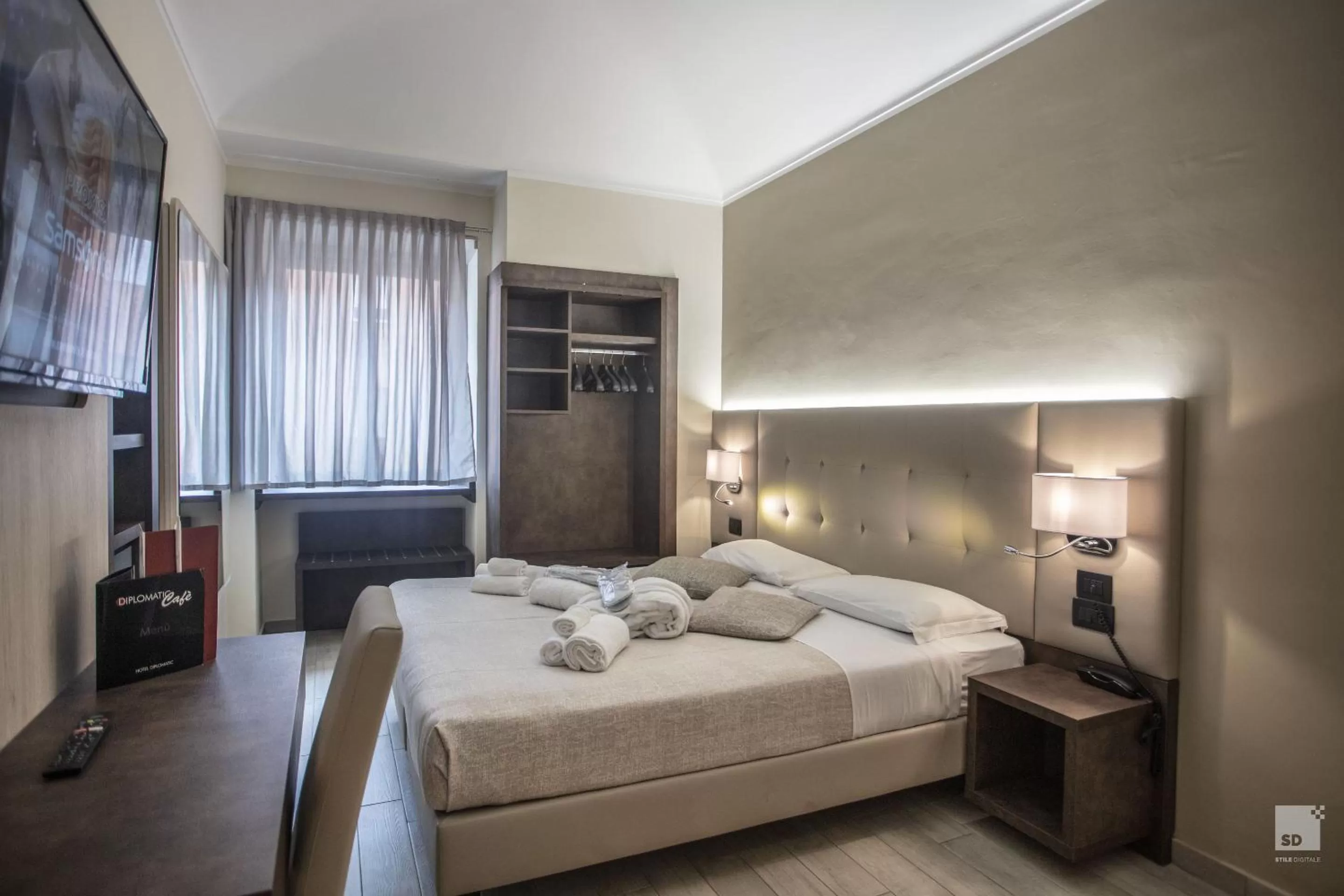 Bed in Hotel Diplomatic