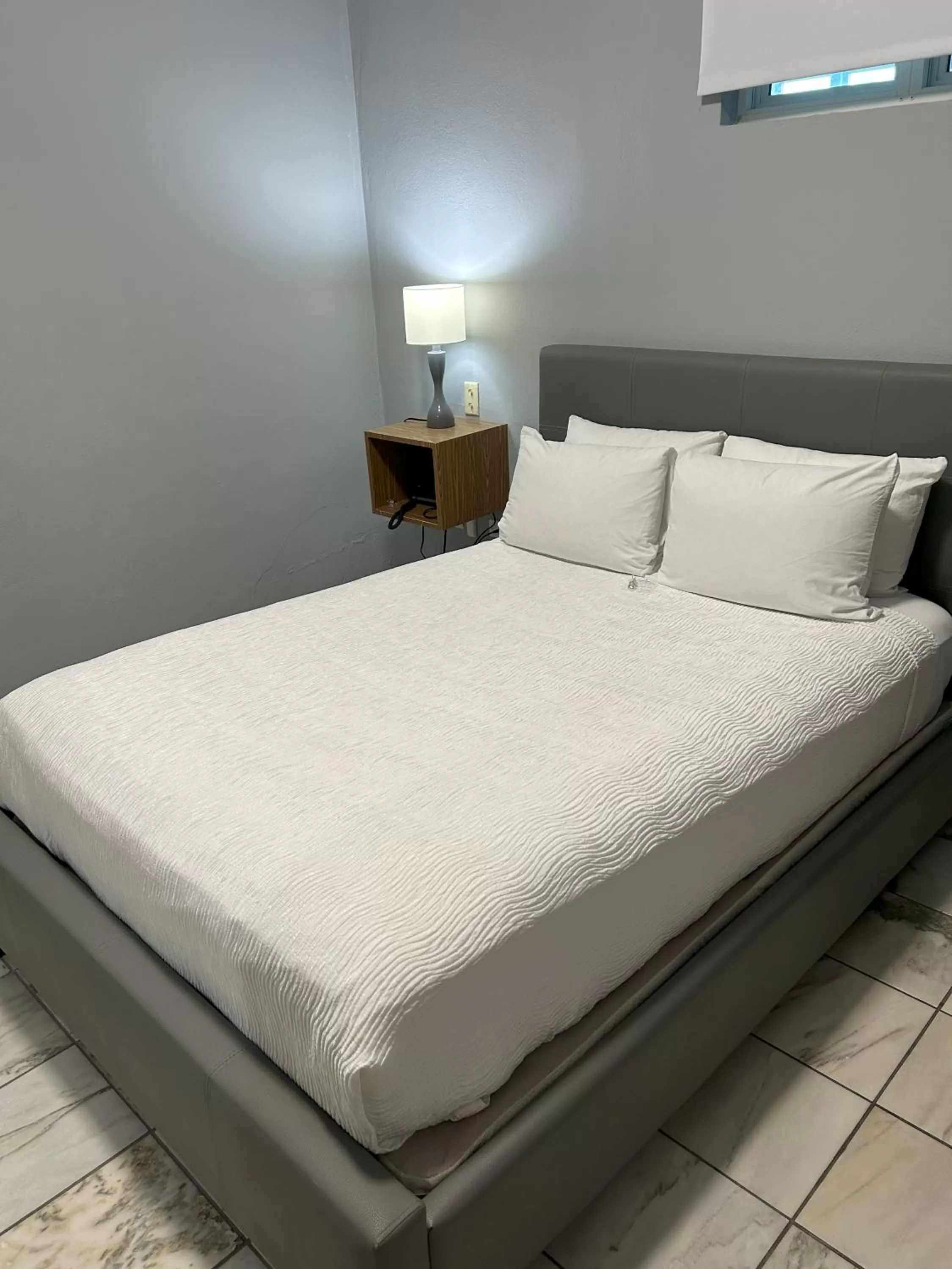 Bed in Coral Princess Hotel