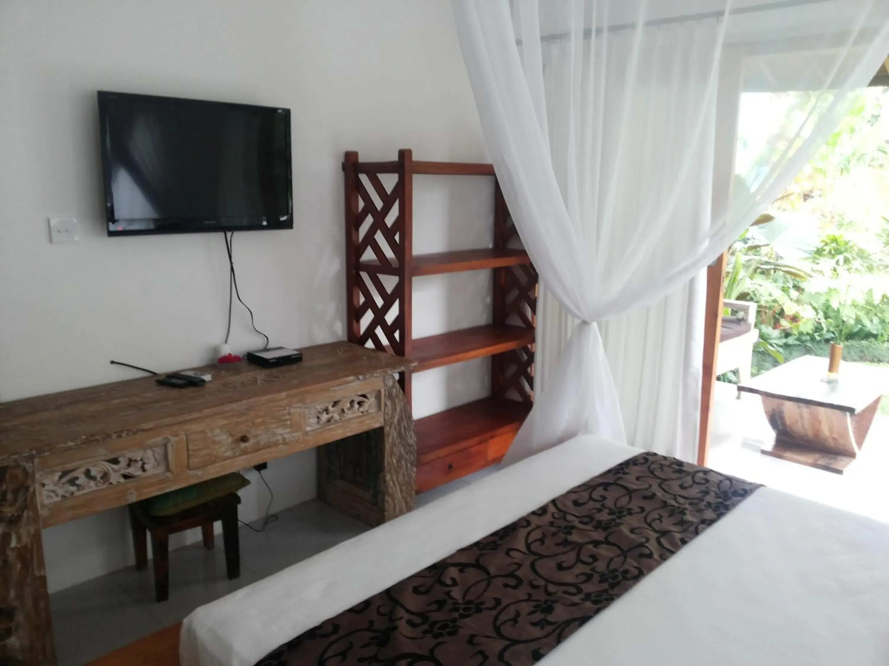 Bedroom, TV/Entertainment Center in Bali Dream Resort Ubud by Mahaputra