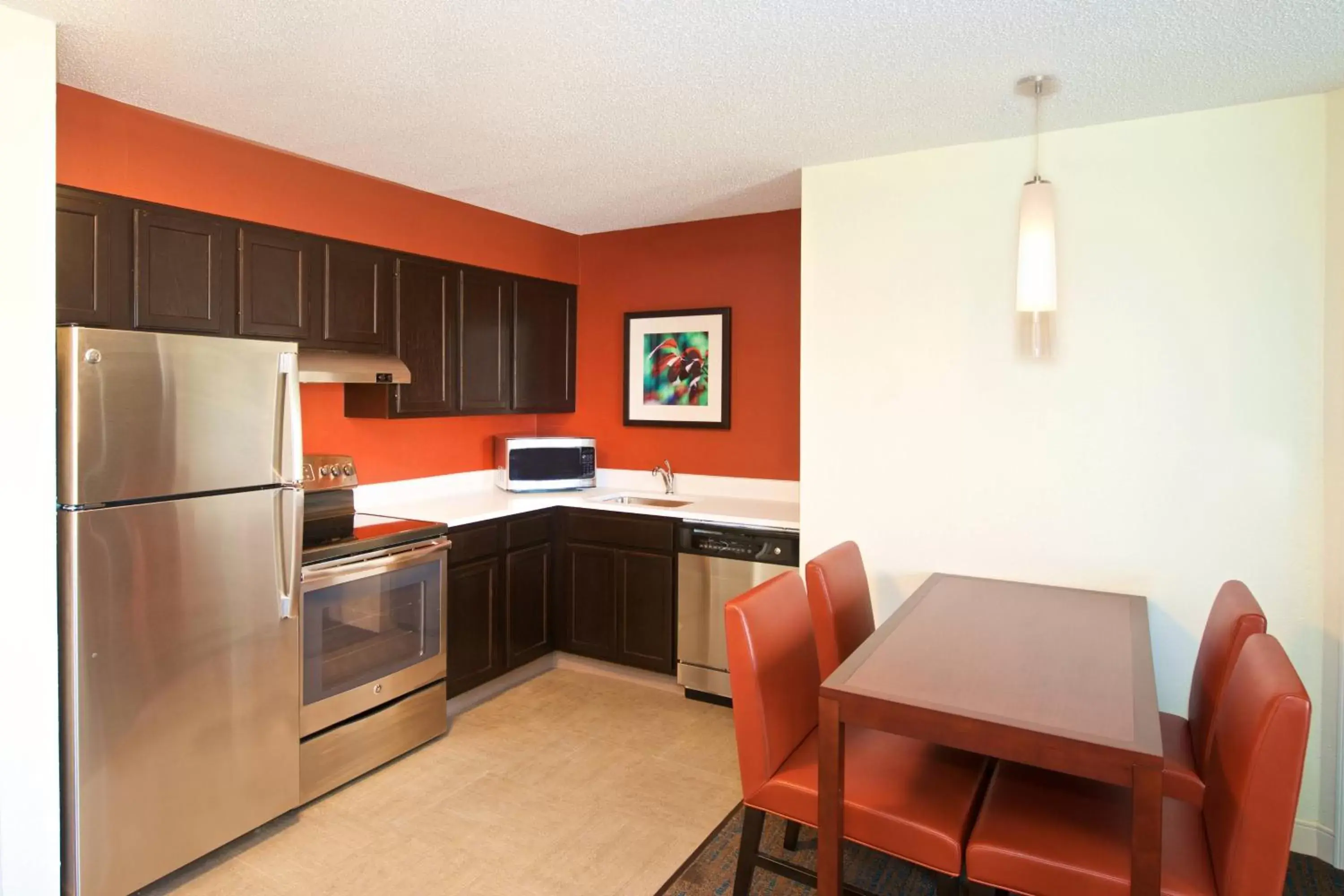 Bedroom, Kitchen/Kitchenette in Residence Inn by Marriott Evansville East