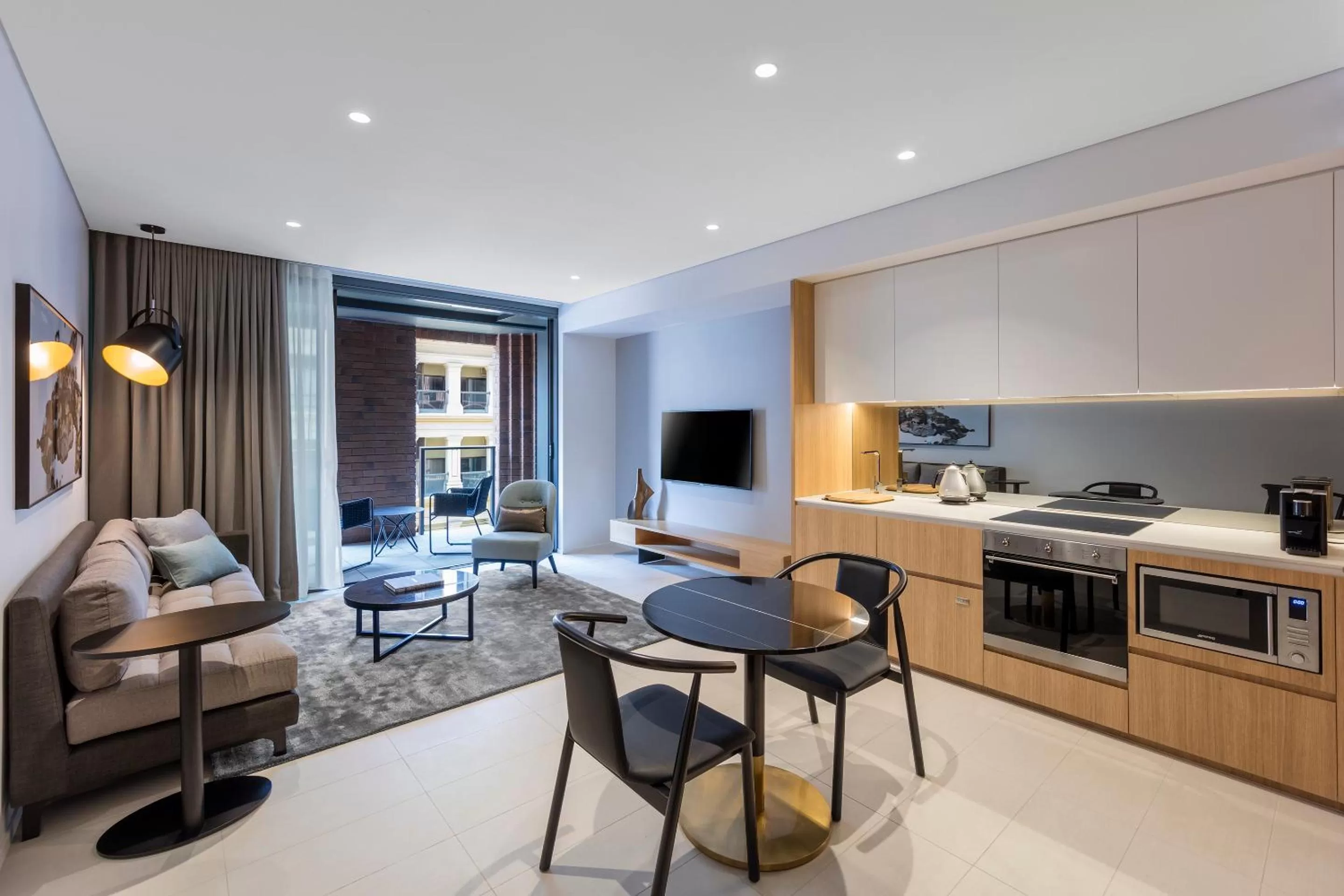 Kitchen or kitchenette in SKYE Suites Sydney