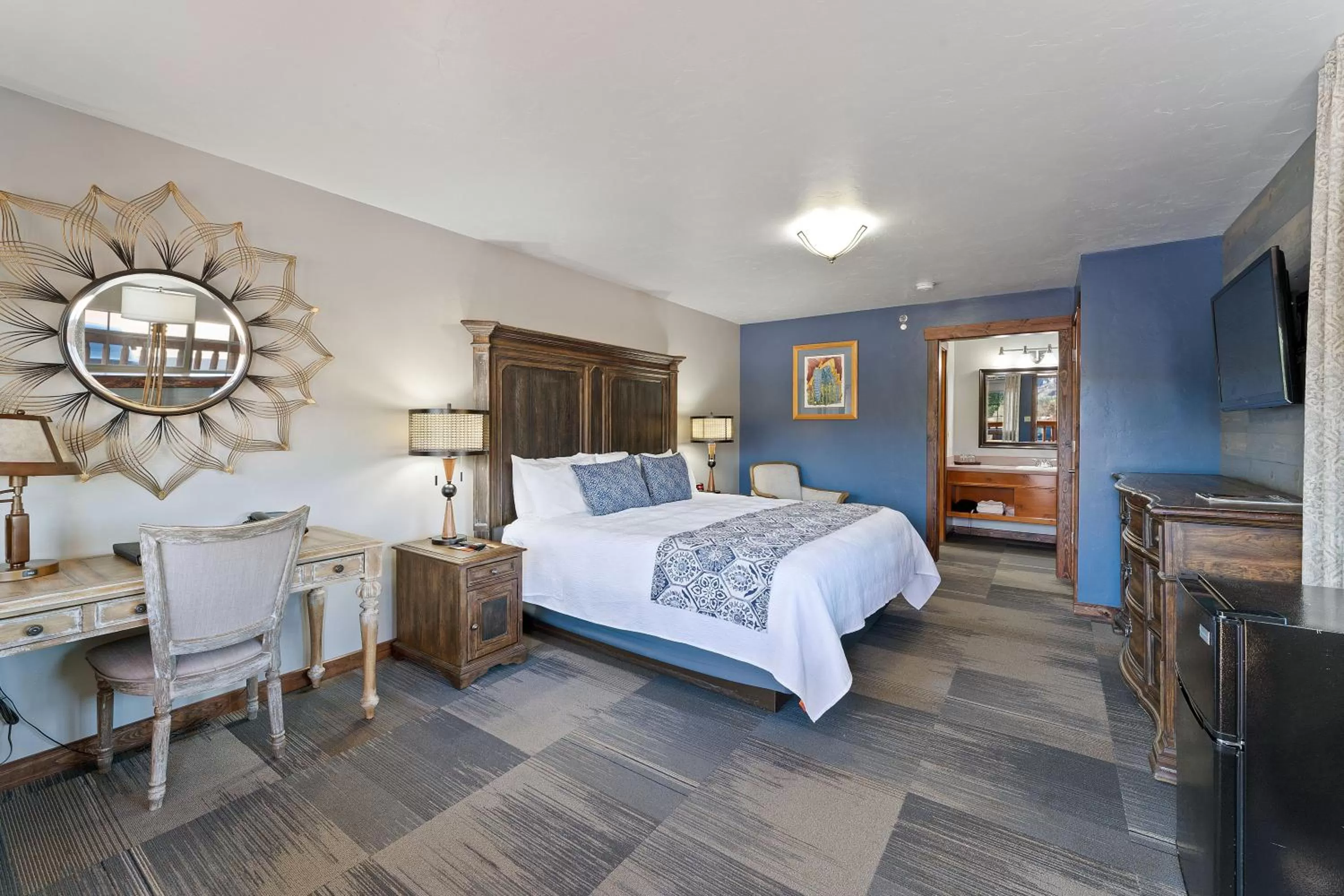 Bed in Desert Rose Resort & Cabins