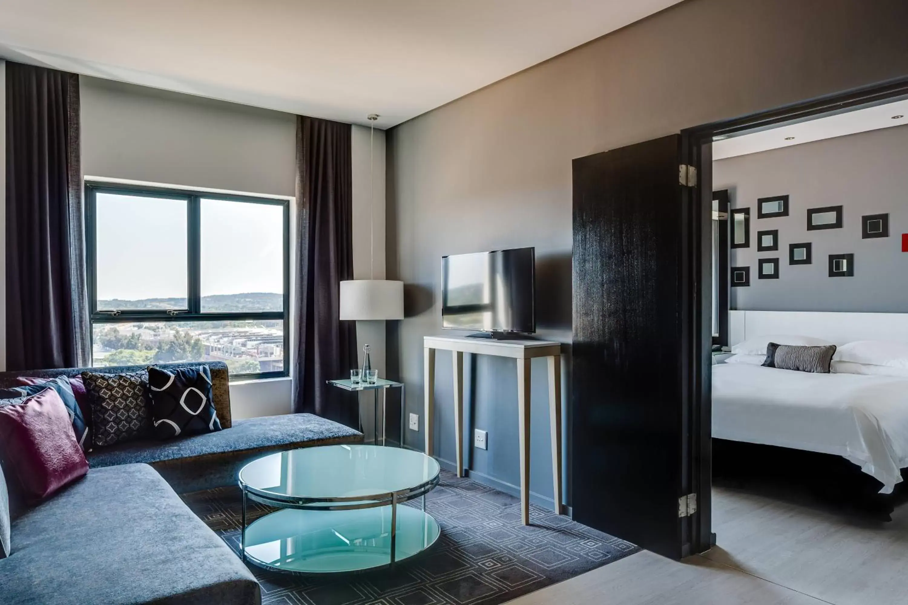 Bedroom, Seating Area in Protea Hotel Fire & Ice! by Marriott Pretoria Menlyn