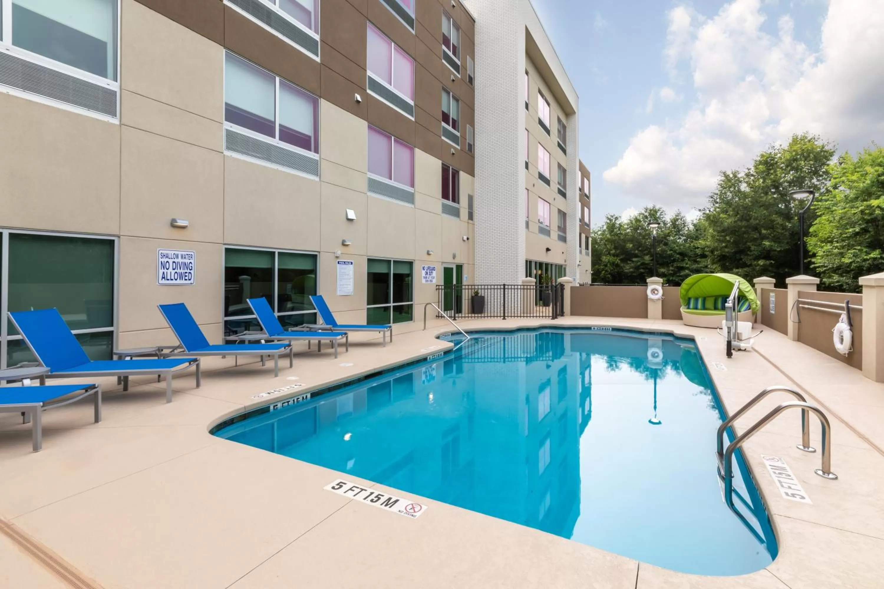 Swimming pool in Holiday Inn Express & Suites Greenville S - Piedmont by IHG