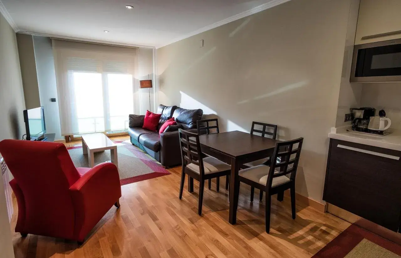 Living room, Dining Area in Apartamentos Albatros