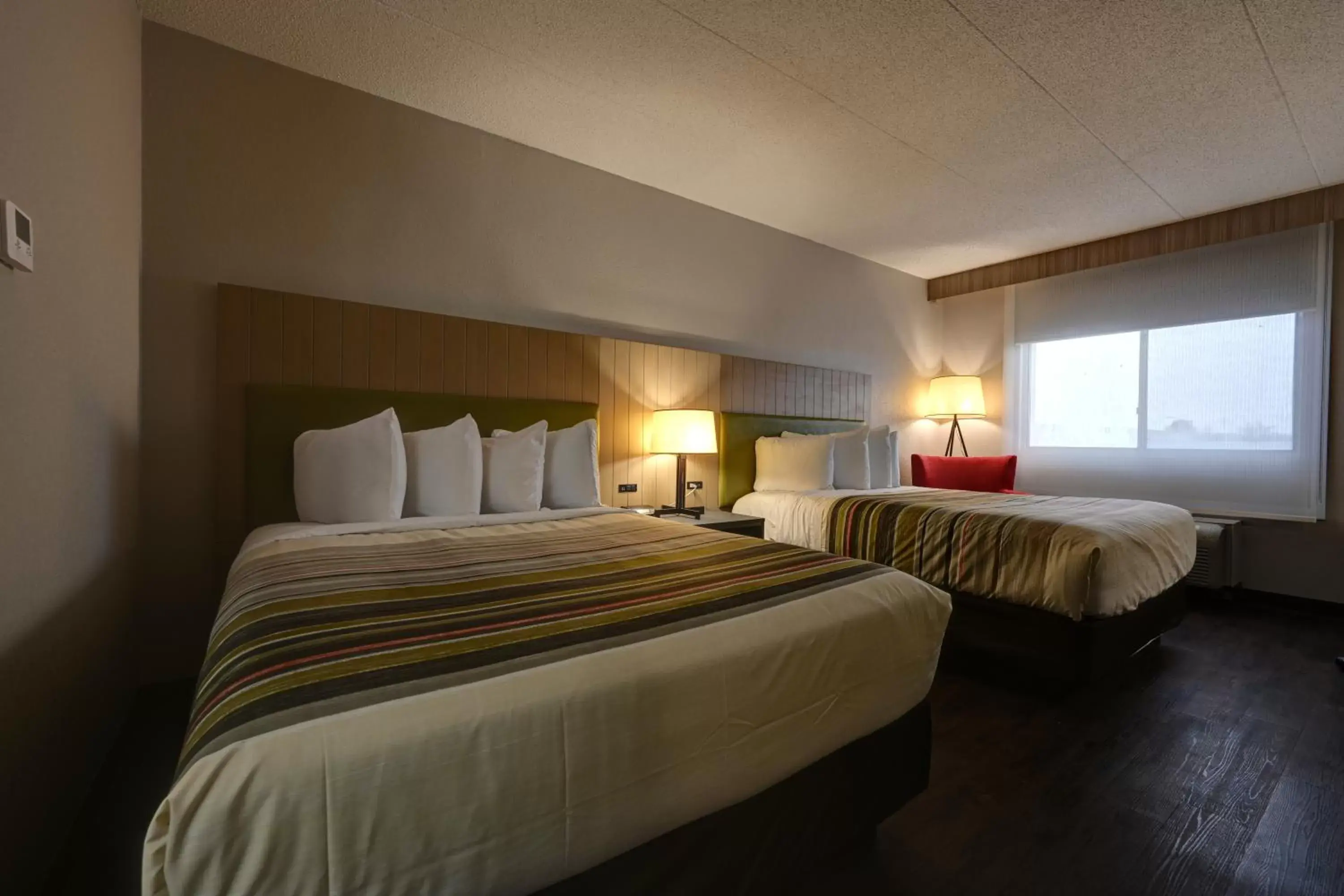 Bed in Country Inn & Suites by Radisson, Pierre, SD